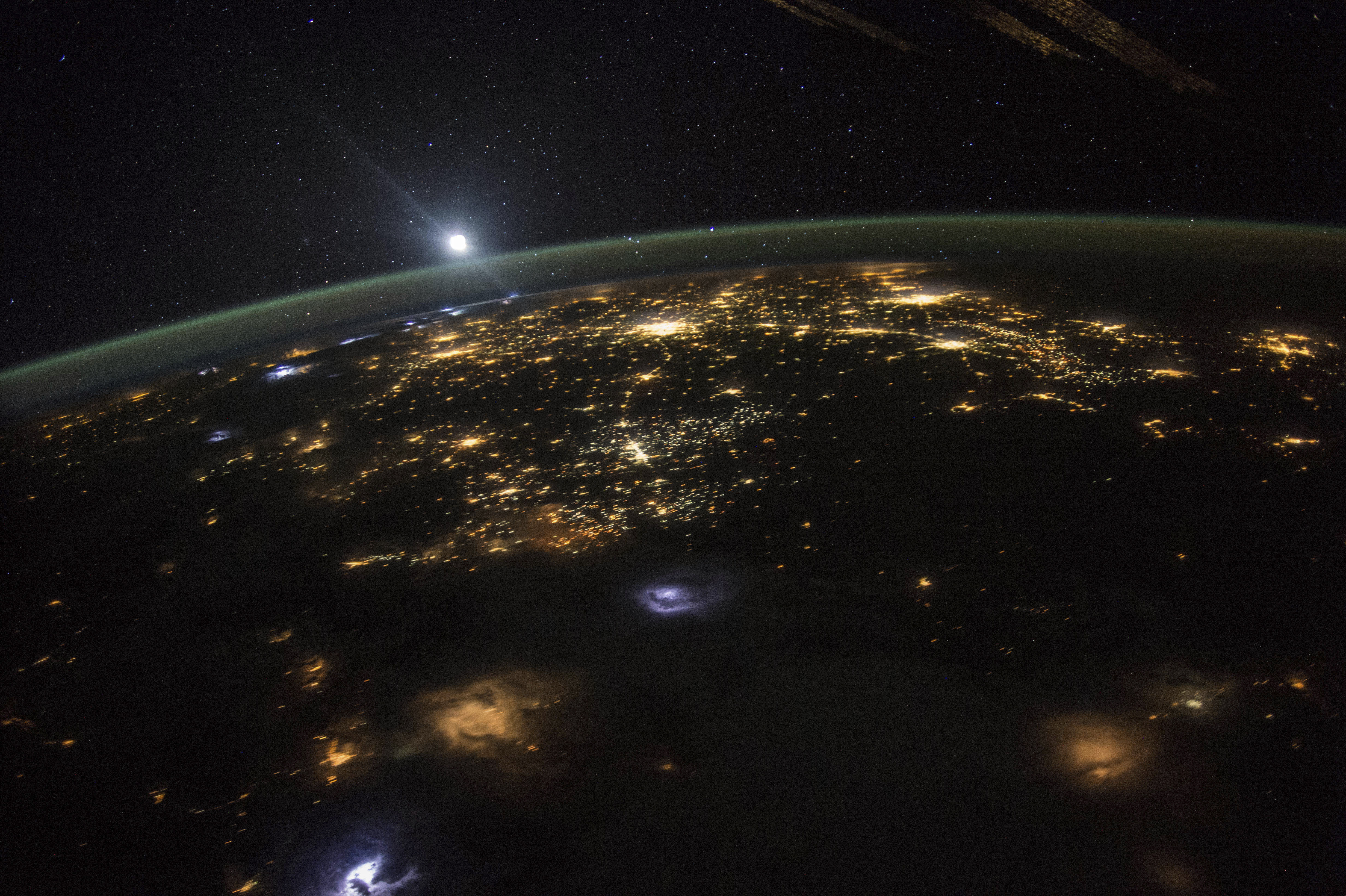 Sunrise from the vantage point of the International Space Station, about 220 miles above the surface of the Earth.