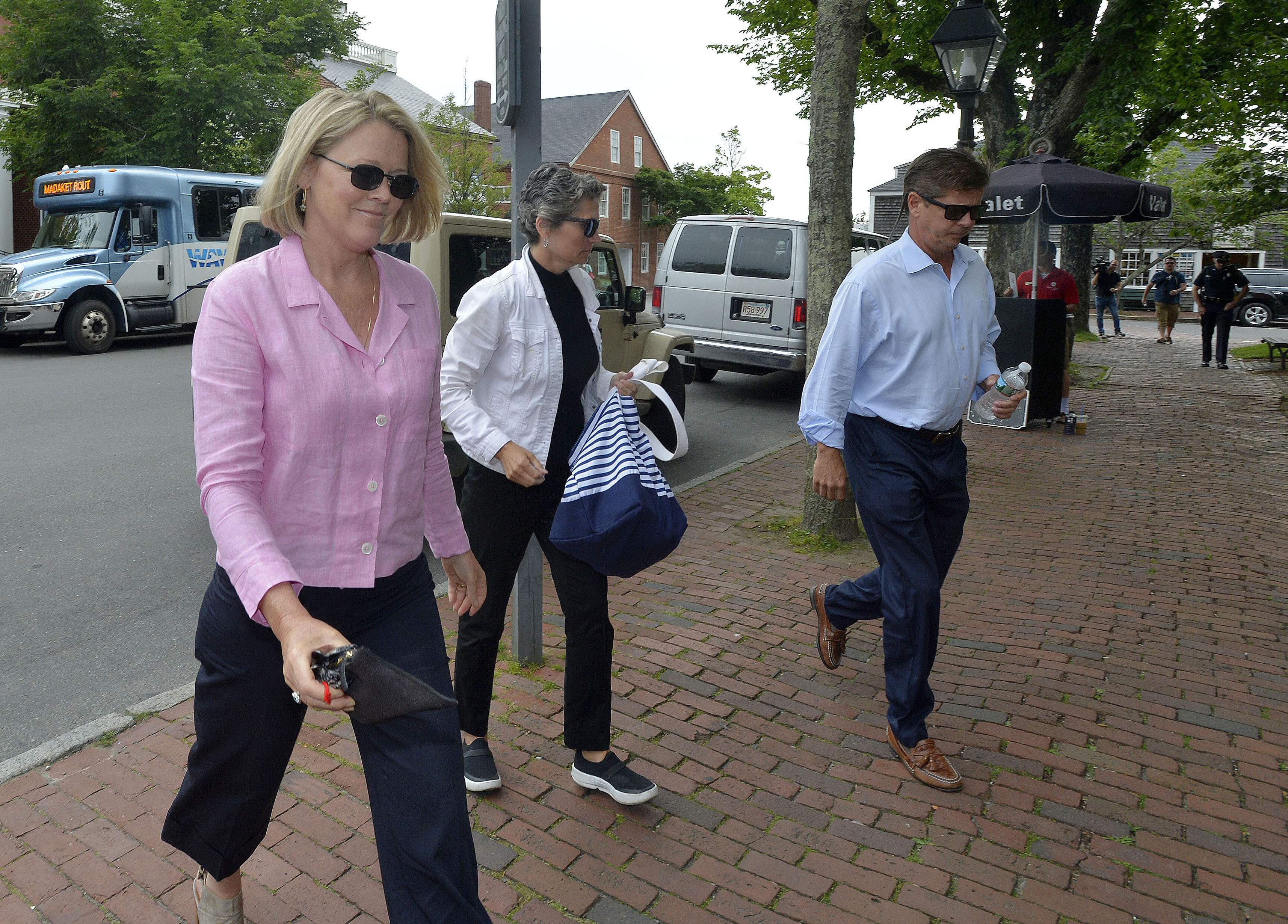 Heather Unruh (left) arrived with her husband (right) and her son (not shown) at a pre-trial hearing in the Kevin Spacey sexual assault case at Nantucket District Court on Monday.