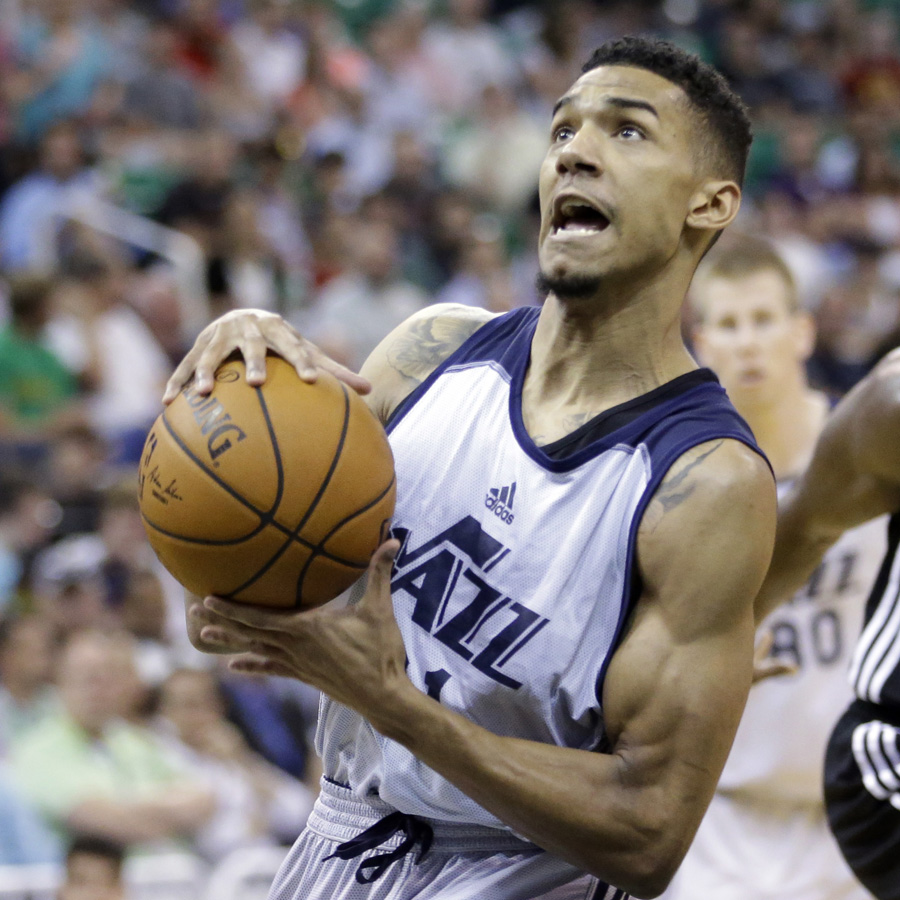 The Jazz's Olivier Hanlan, formerly a Boston College star, drives to the basket during a summer league game vs. the Spurs.