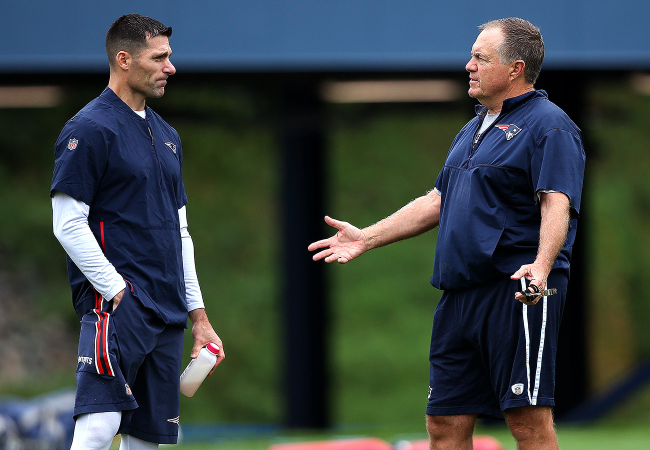 Patriots director of player personnel Nick Caserio talked with coach Bill Belichick during a Sept. 2018 practice.