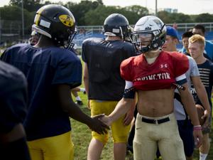 Frelick greeted Andover players at the recent scrimmage in Lexington.