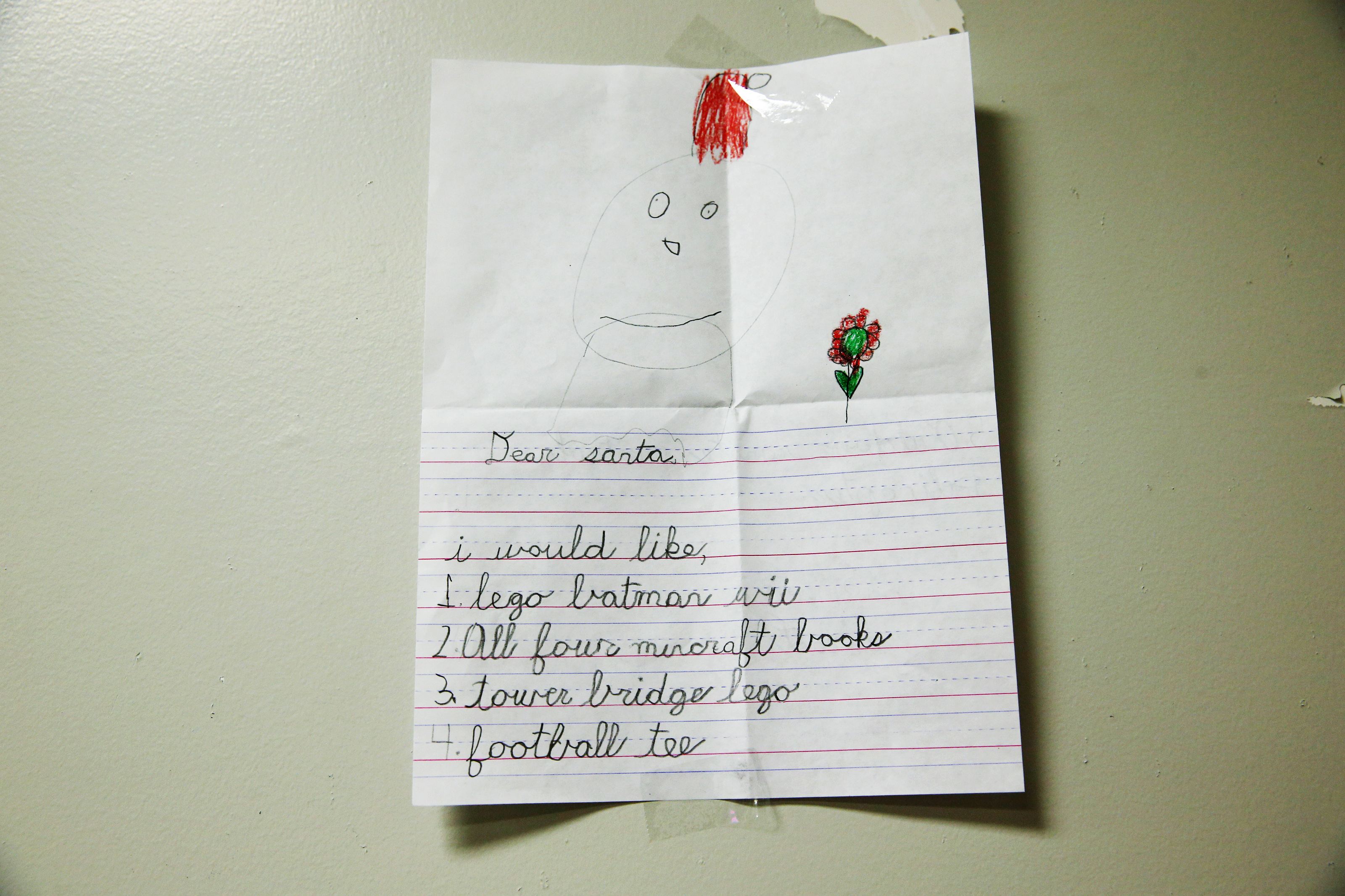 A letter to Santa hangs on a wall at the Post Office annex in South Boston.