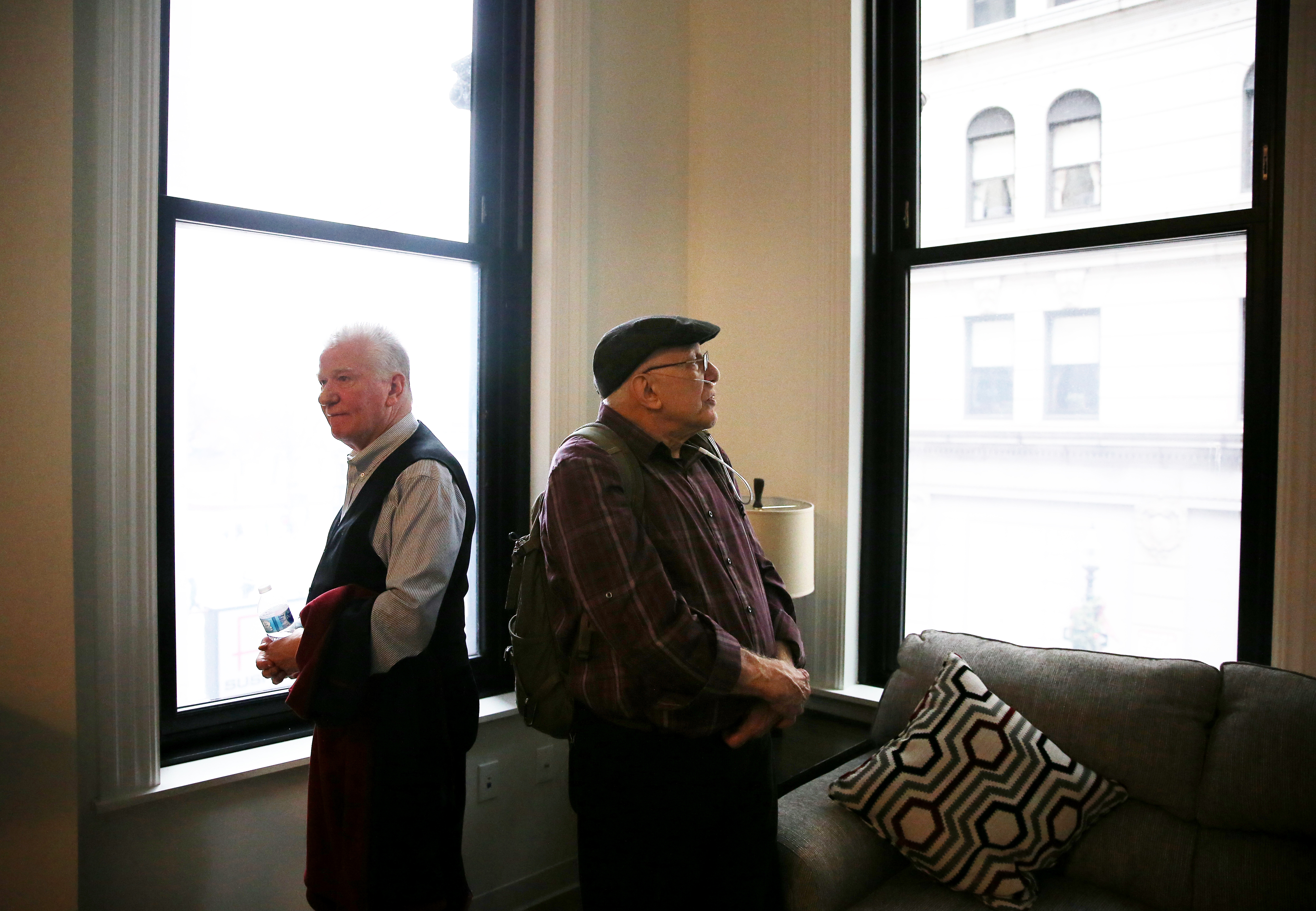 John Callaghan (left) and Brian Richard admired a studio apartment while touring The Union Saturday.