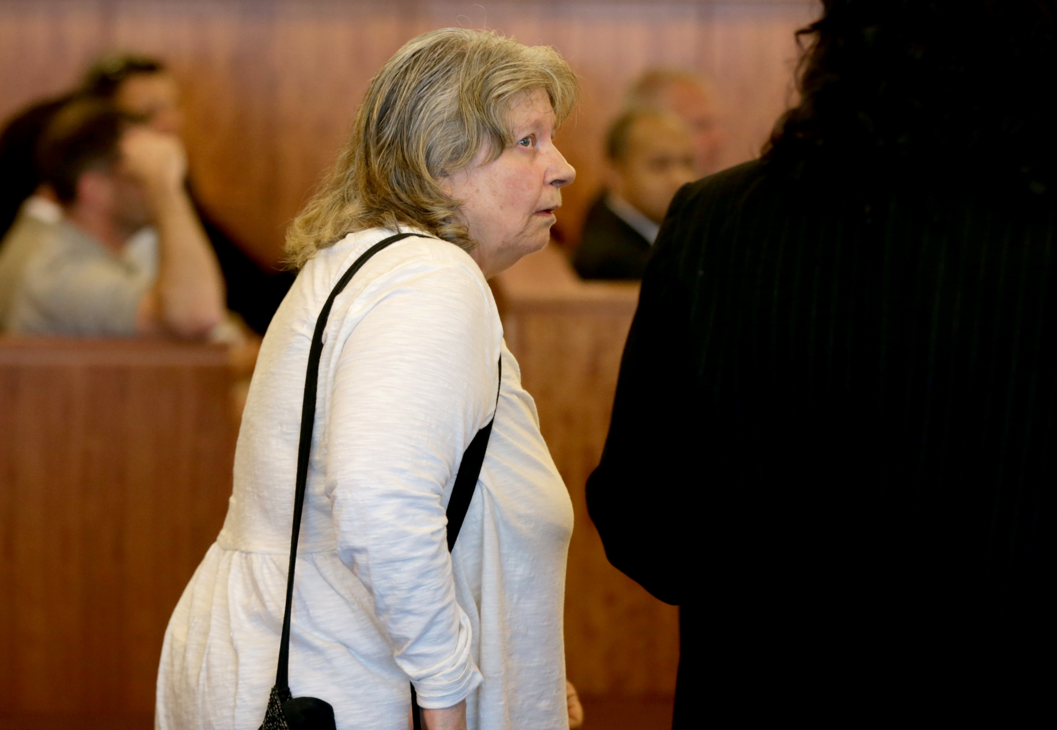 Charlotte Medeiros was indicted on charges of involuntary manslaughter, neglect of an elderly person, embezzlement, and larceny after the 2017 death of an 80-year-old widow she was caring for.