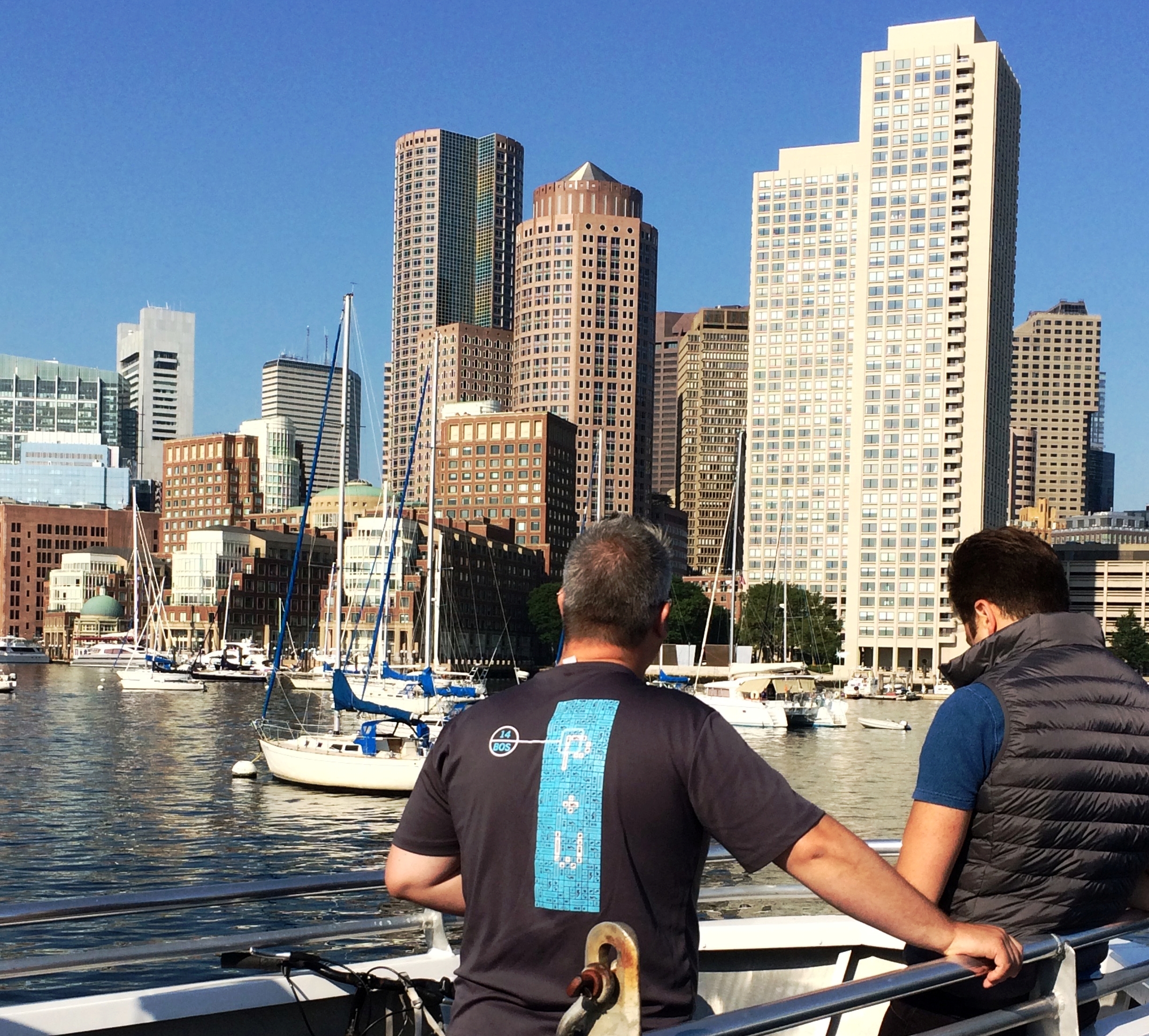 Andrew Steingiser of Swampscott (left) and Arlen Stawasz of Lynn as the ferry approaches Boston.