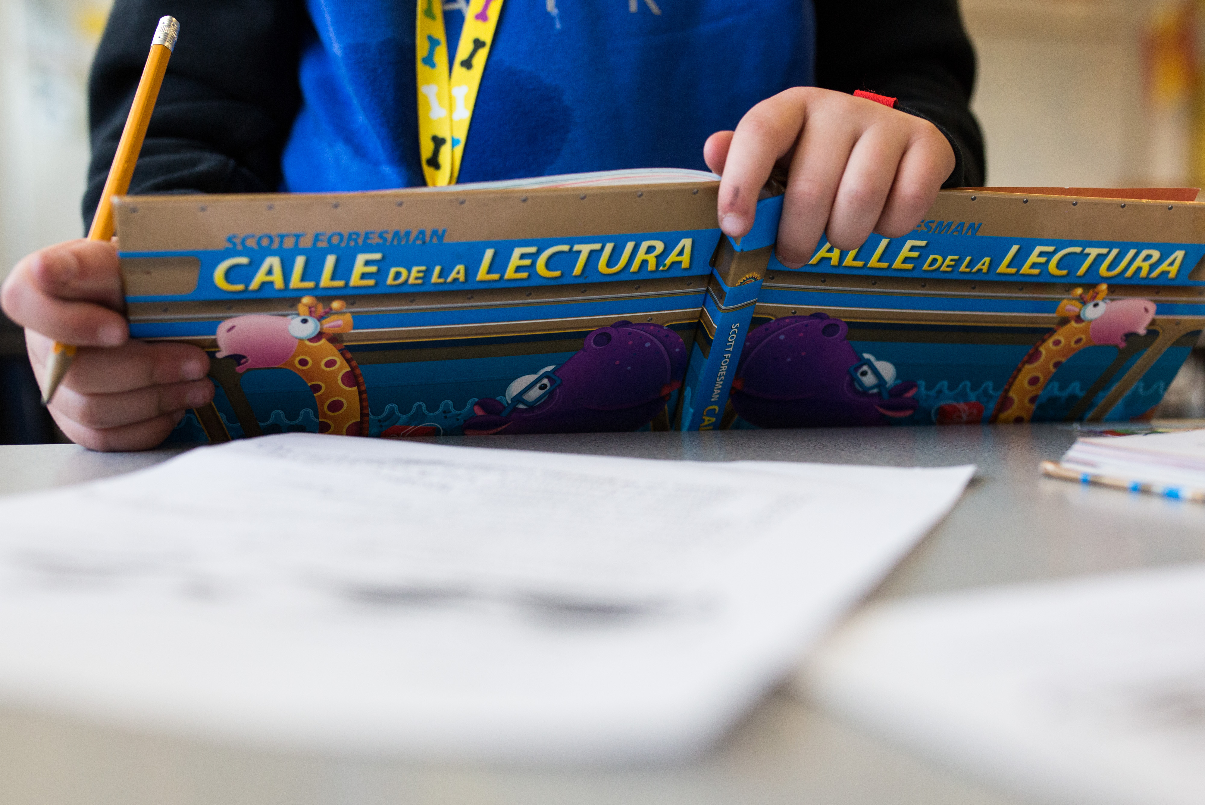 Student Colton Hoffman held a workbook as he participated in a Spanish language immersion program at Park City’s McPolin Elementary School.