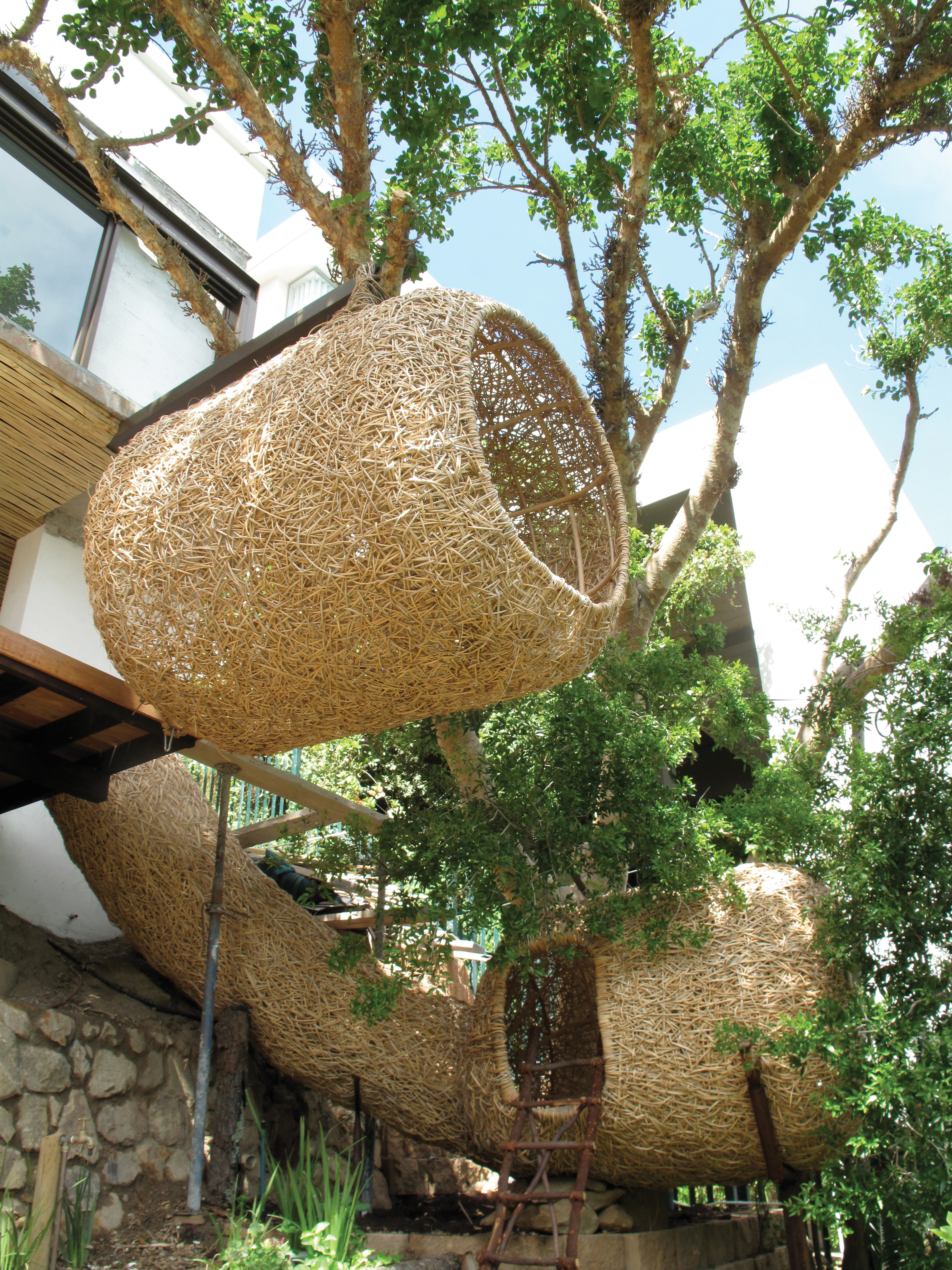 With Nettleton Road Nest, Porky Hefer was inspired, he says, by the idea of “lessening your footprint” to mimic bird weavings and make airborne nests for his own species.