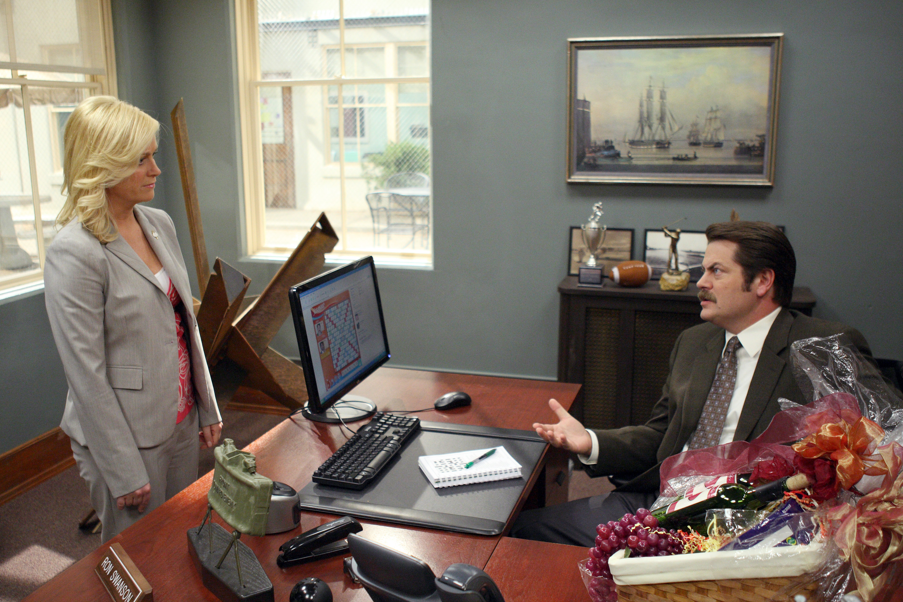 PARKS AND RECREATION -- "Boys' Club" Episode 104 -- Pictured: (l-r) Amy Poehler as Leslie Knope, Nick Offerman as Ron Swanson -- NBC Photo: Justin Lubin 03tvpregnant