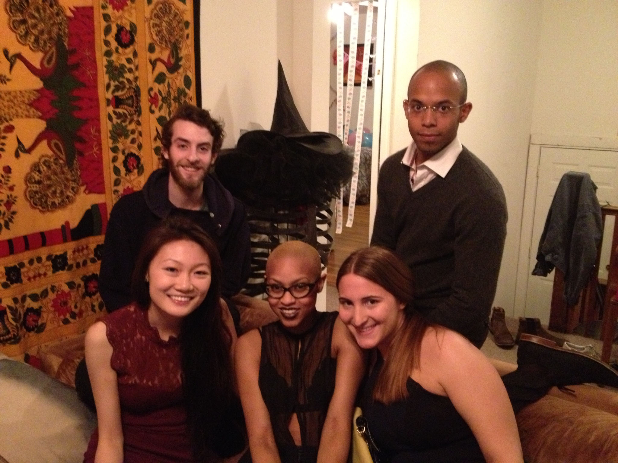 (Clockwise from top left) Housemates Nick Moore, Thiérry Désiré, Alex Mark, Avaloi Atkinson, and Binland Lee, in the living room of their apartment at 87 Linden St. a week before the fire there in April 2013.