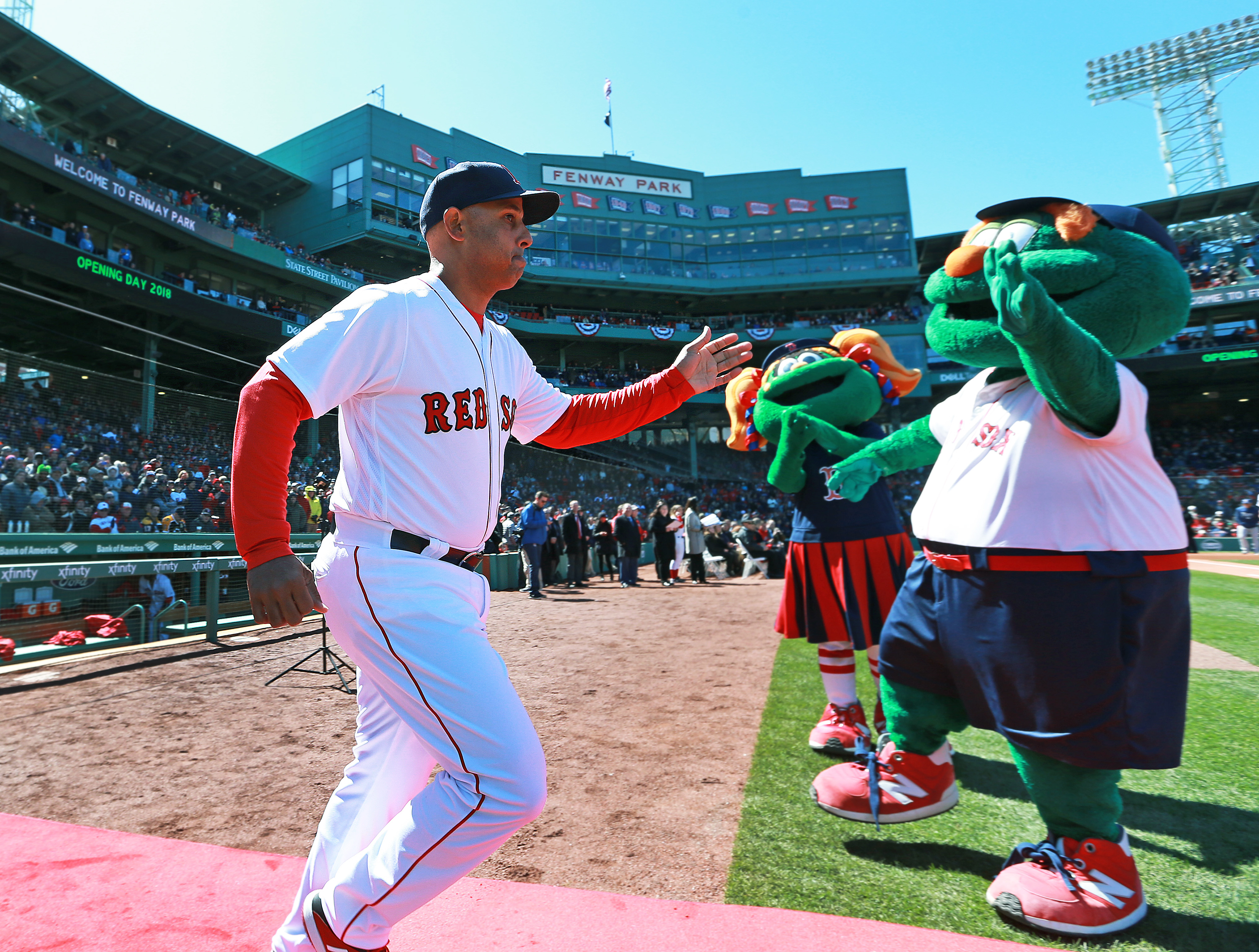 Alex Cora is introduced before his first game at Fenway Park as Boston's skipper in 2018.