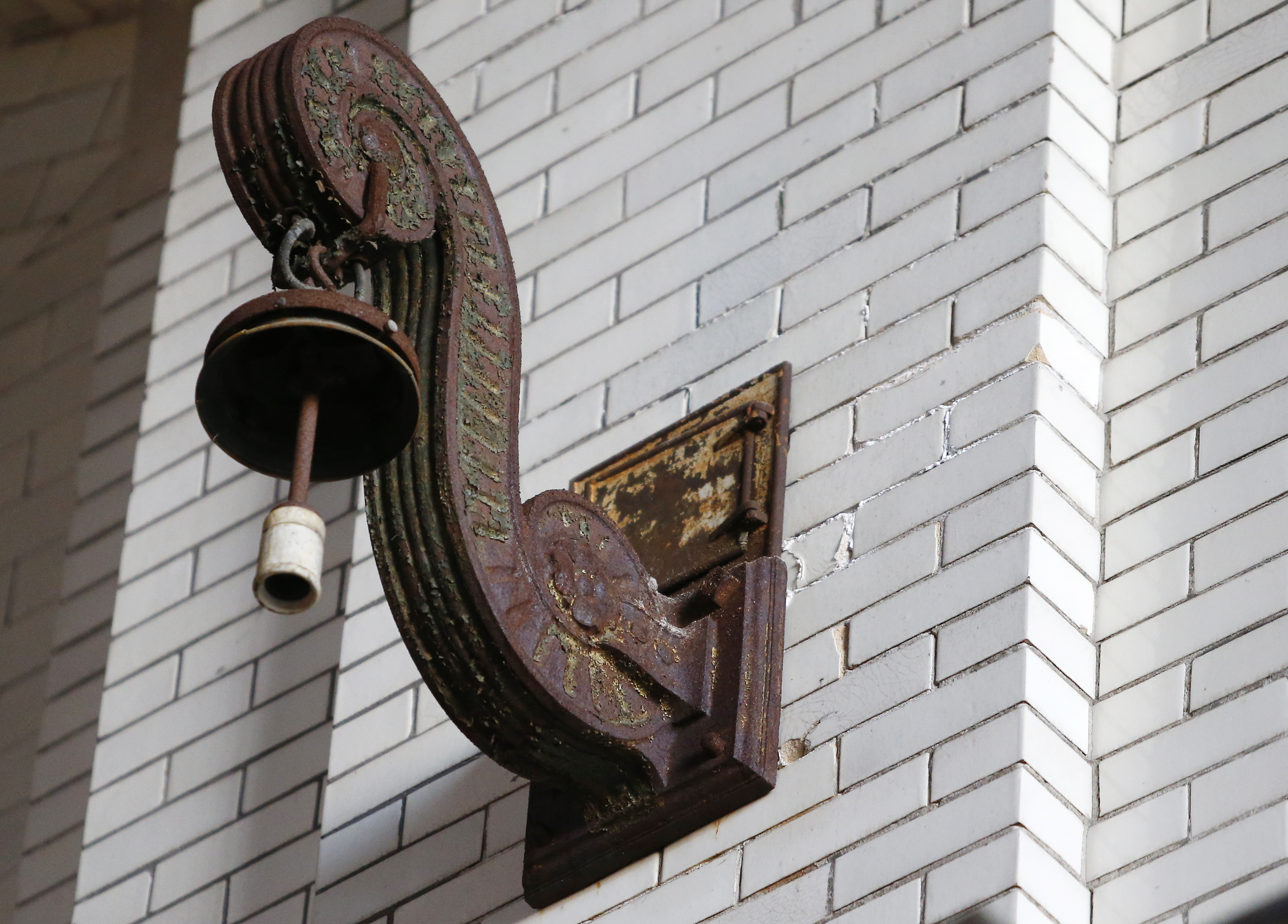 A light fixture from another century inside the L Street Power Station in South Boston.