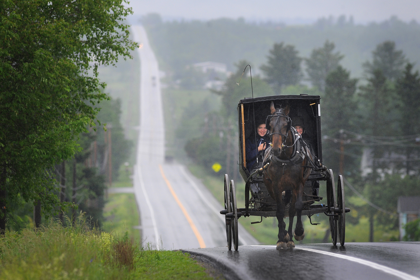 The Amish use horse-drawn buggies while traveling in the towns just to the east of the Katahdin Woods and Waters National Monument.