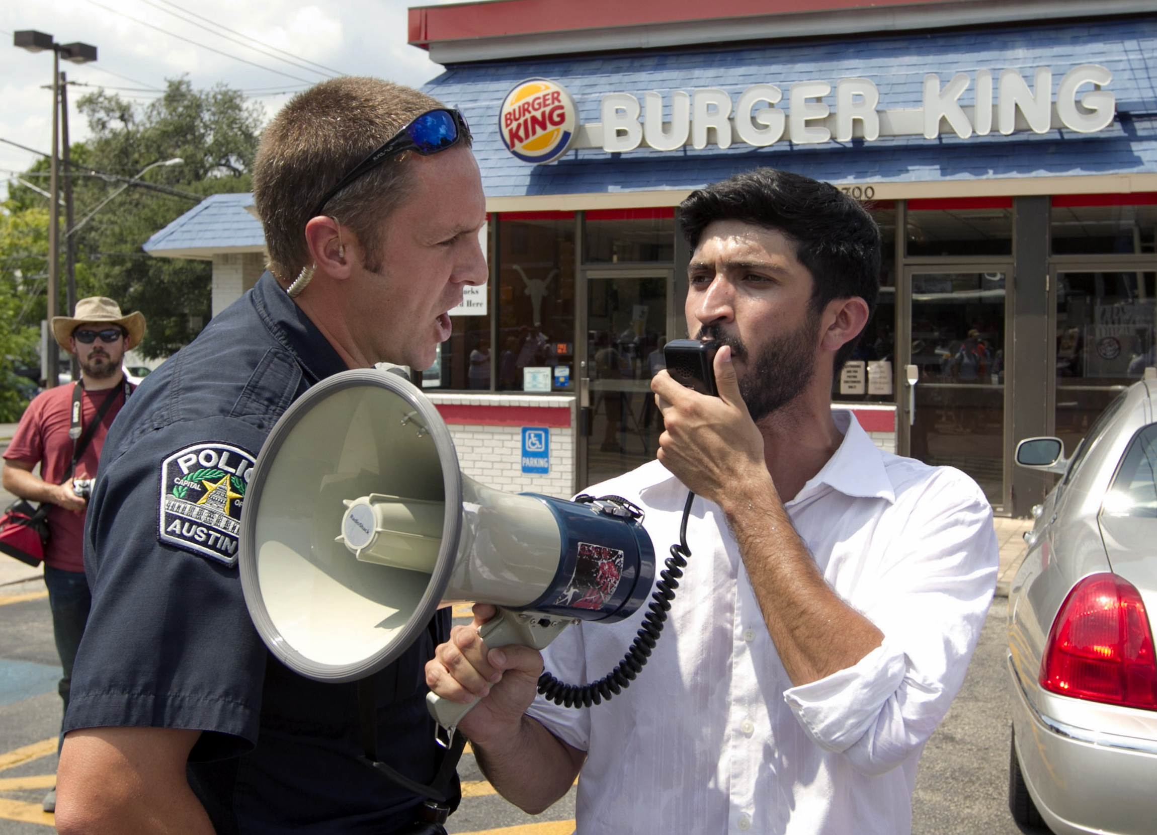 A police officer ordered Greg Casar, who was addressing a crowd of about 200 in Austin, Texas, off Burger King property.