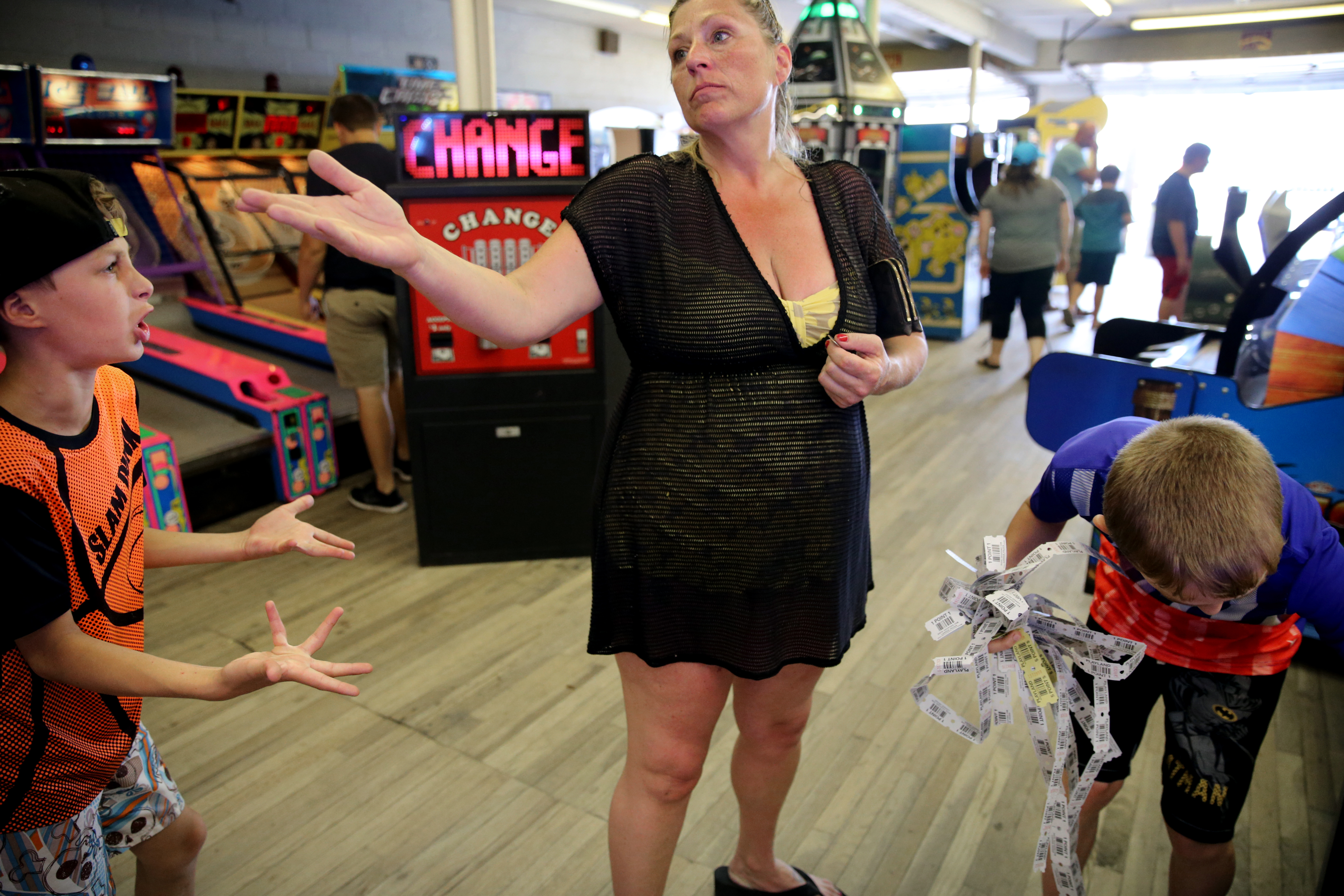 Will Biscan, 11, left, complained to his mother after she gave her winnings of 250 tickets to his brother, Connor, while visiting the Playland Arcade at Hampton Beach, N.H. Will, who used to share a bedroom with Connor, has struggled with his brother’s autism diagnosis. “Will feels that Connor gets a lot more than he does,’’ his mother said.