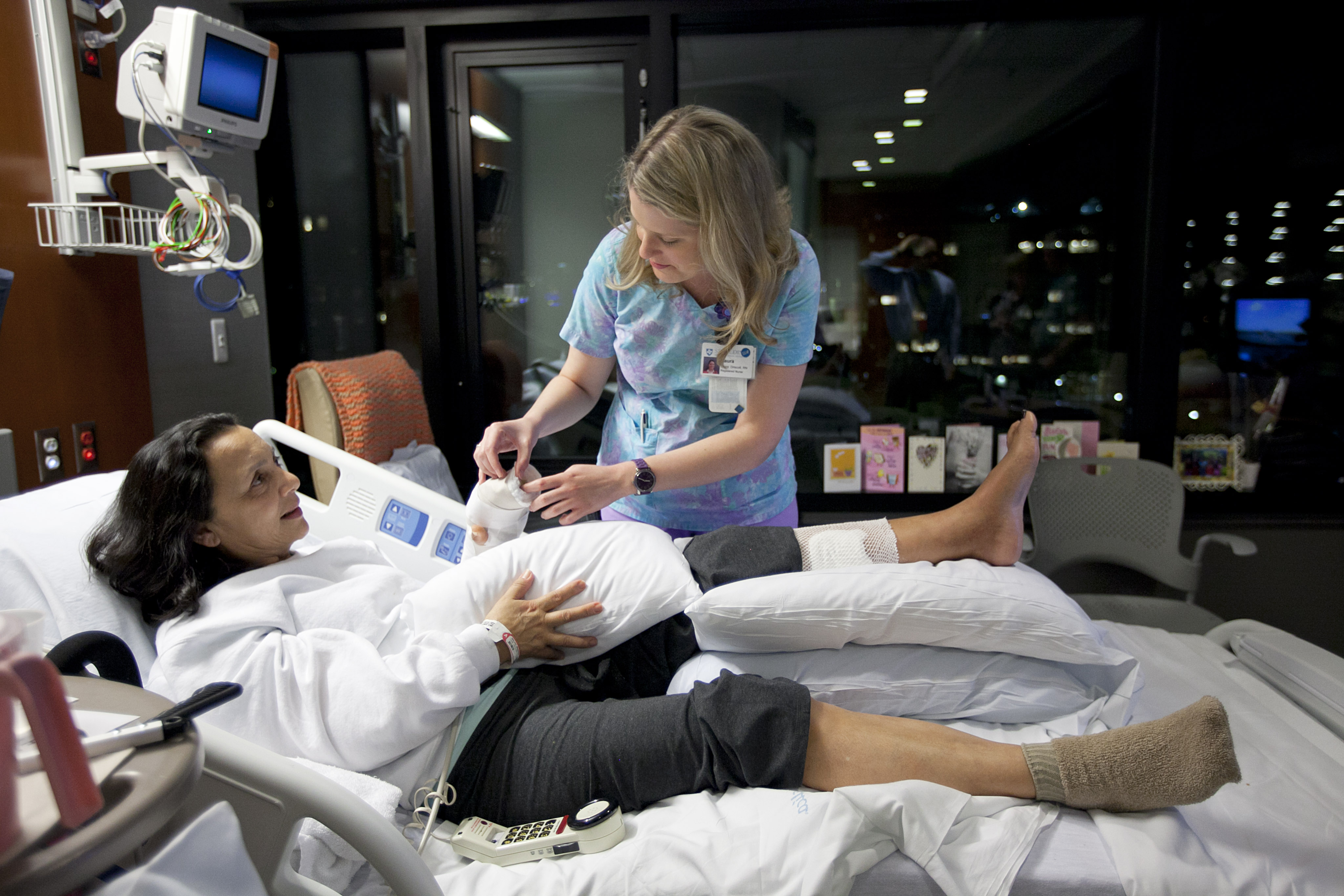 Resident nurse Laura Driscoll treated Martha Galvis, who six weeks after the bombings had mastered many of the requirements that signal enough independence to go home.