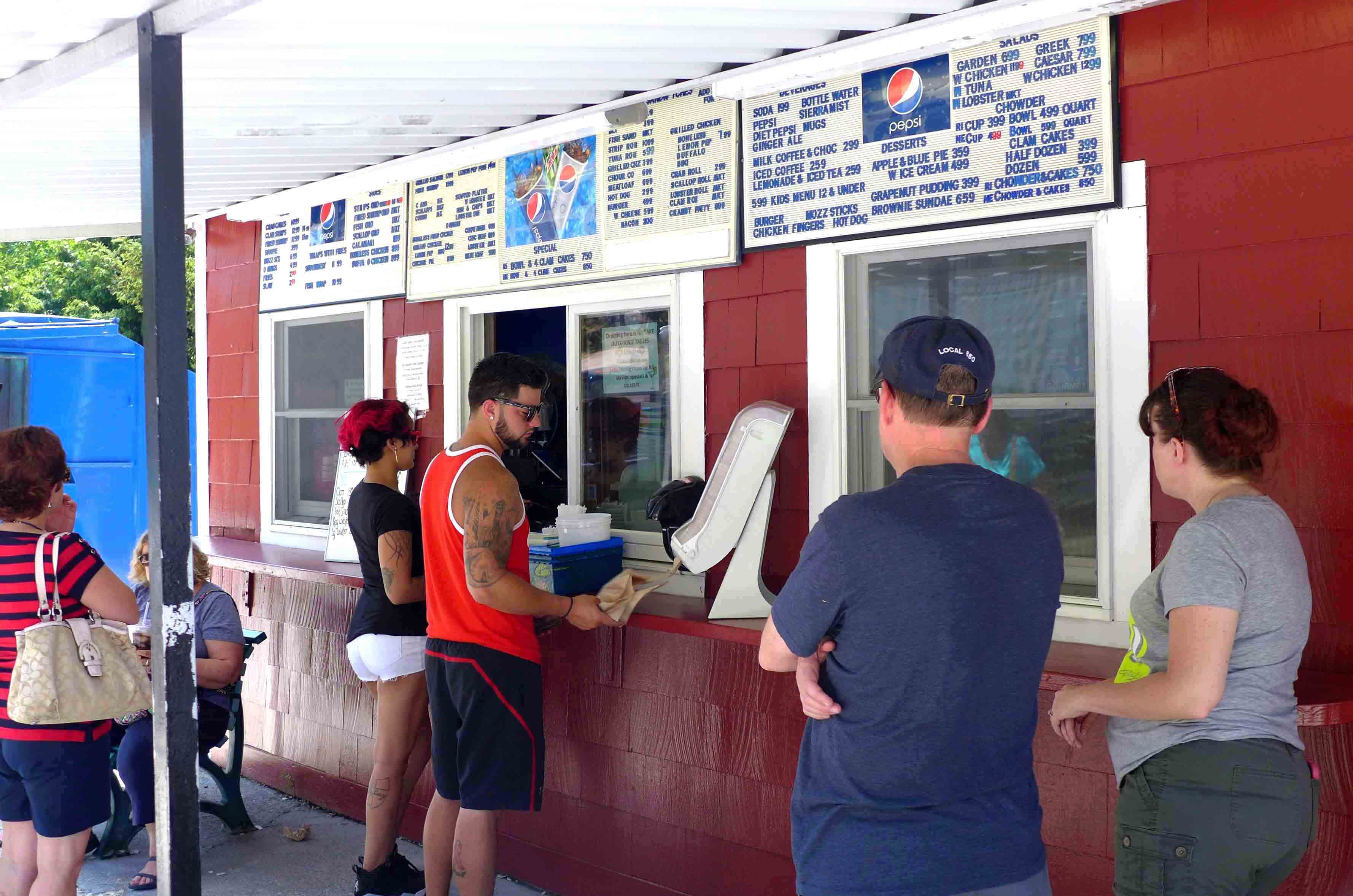 Evelyn’s customers at the takeout window can sit out front or in back, where there’s a view of Nanaquaket Pond.
