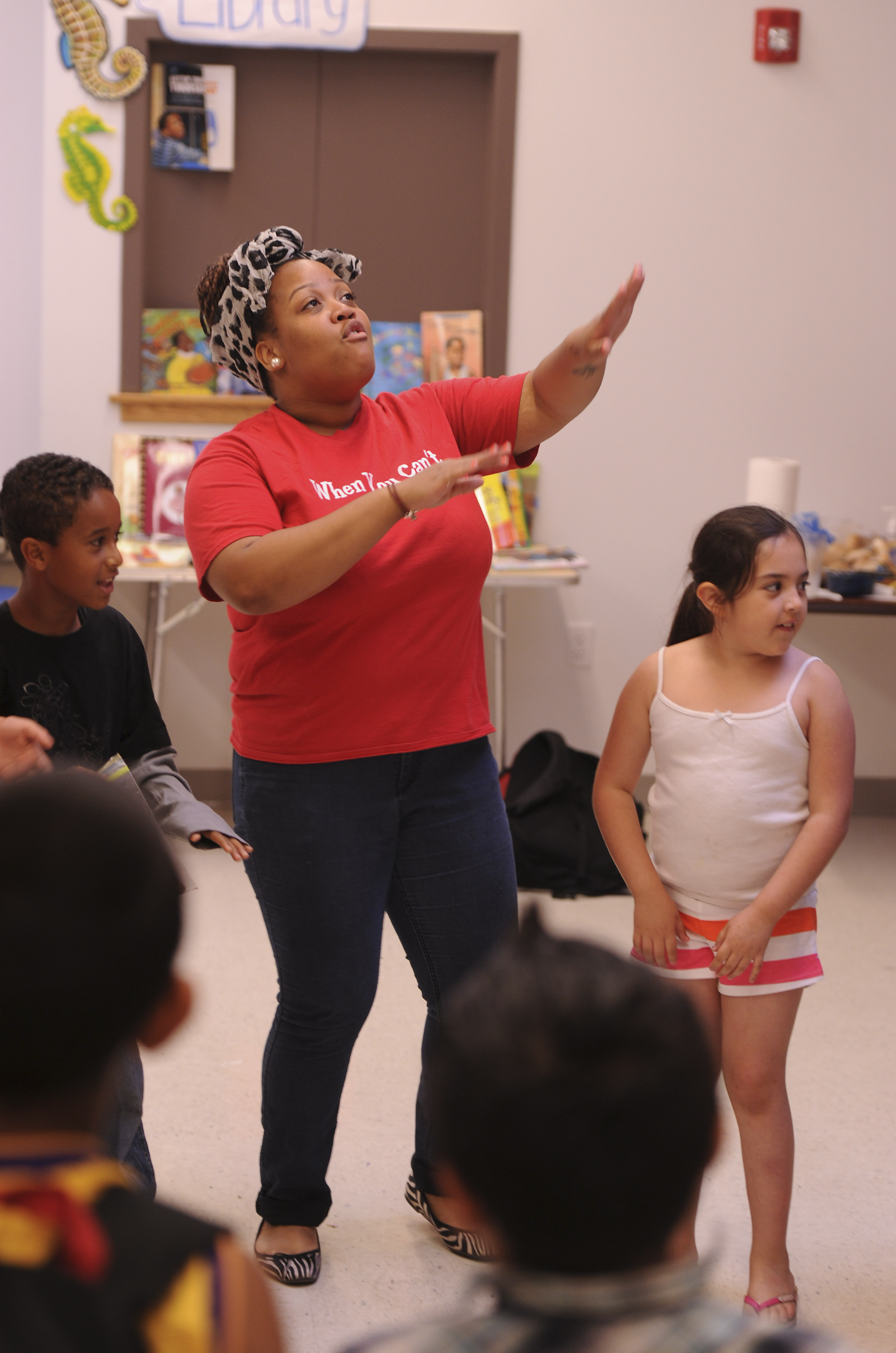 At the Somerville school, Breanya Hogue leads a class in an exercise called harambee.