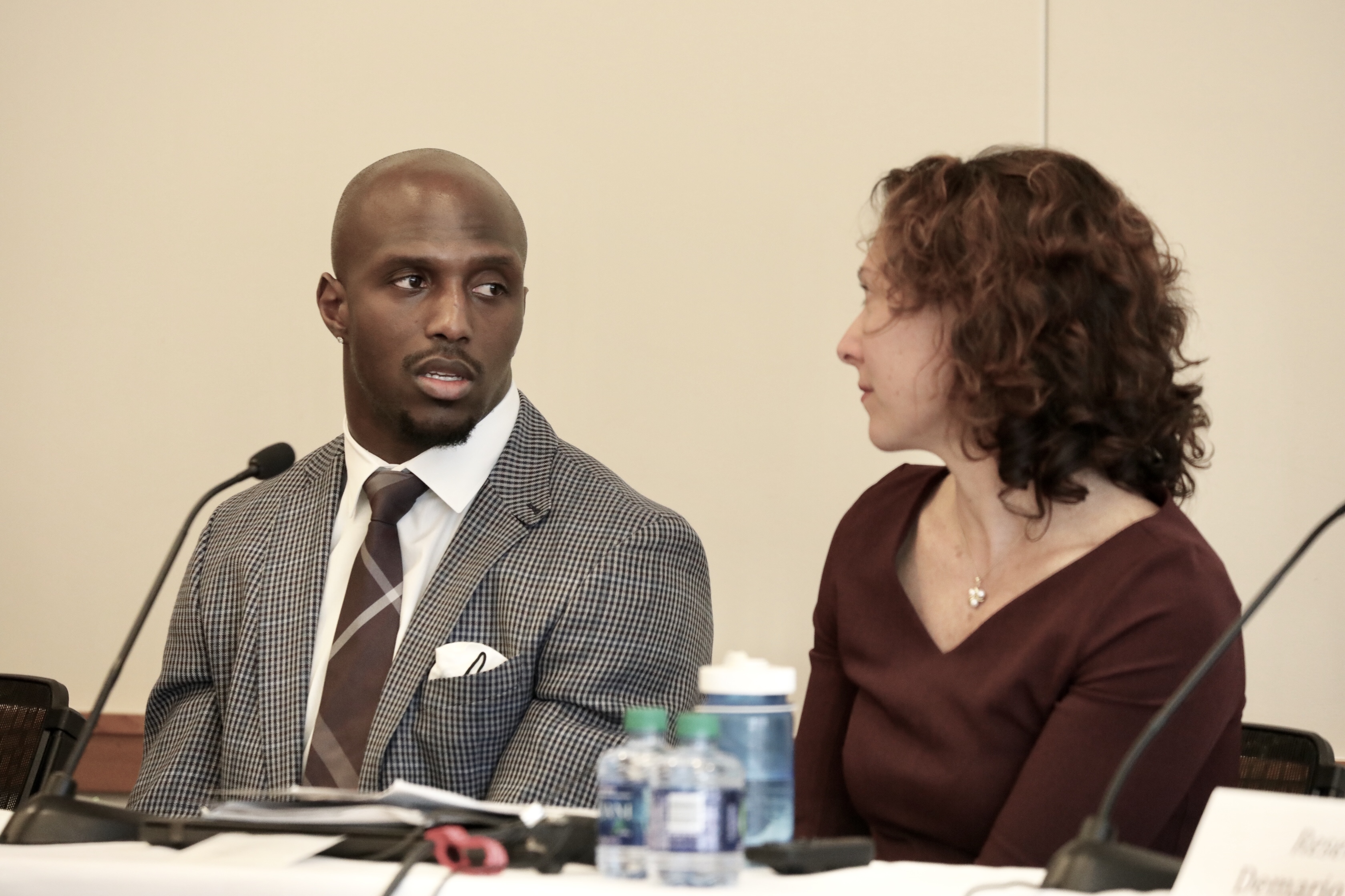 Devin McCourty with panel moderator Emily Bazelon of New York Times Magazine.