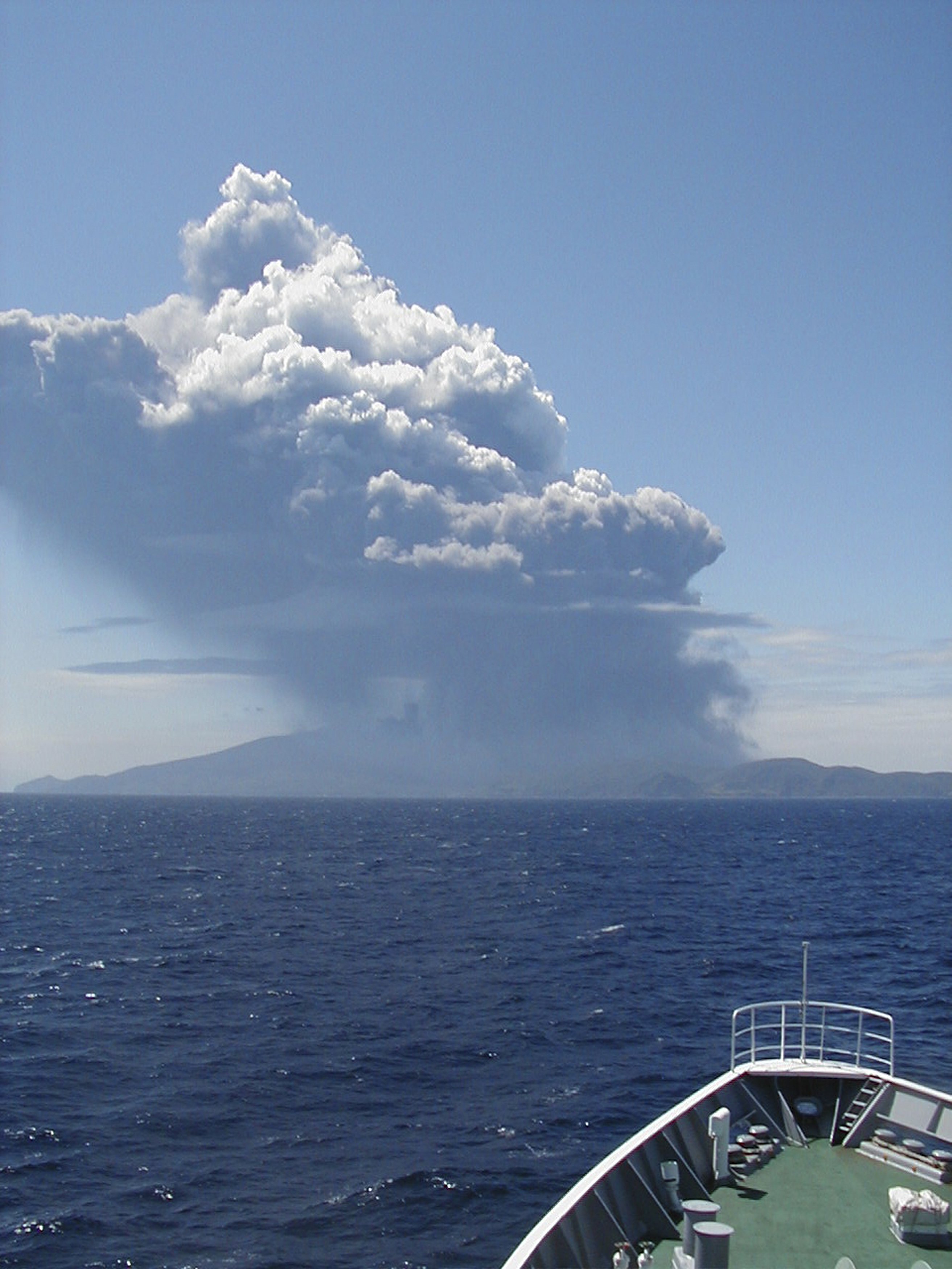 Volcanic gases and debris spewed from Mount Shindake after its eruption Friday on an island in southern Japan.