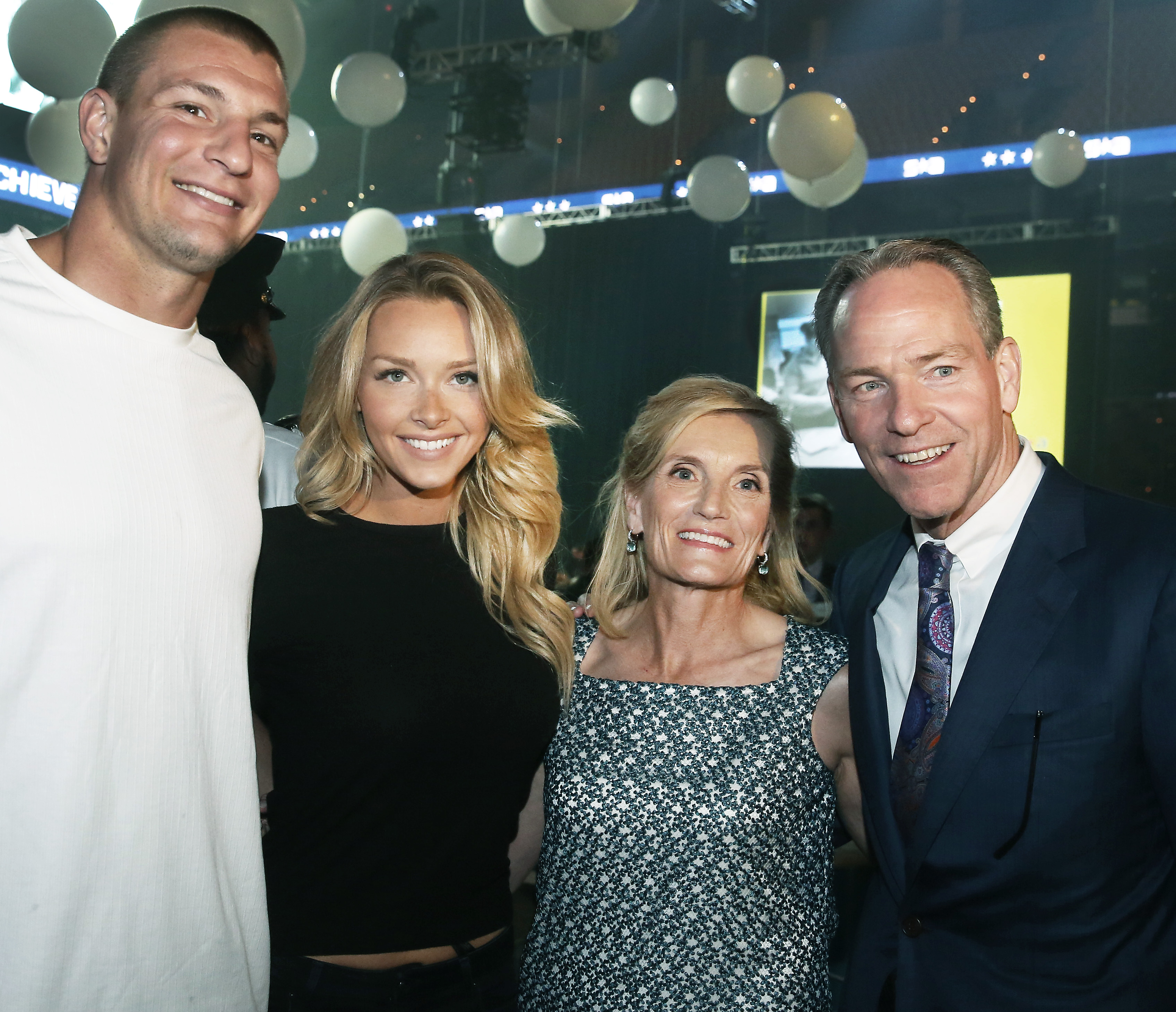 From left: Rob Gronkowski and Camille Kostek with Cyndy and John Fish.