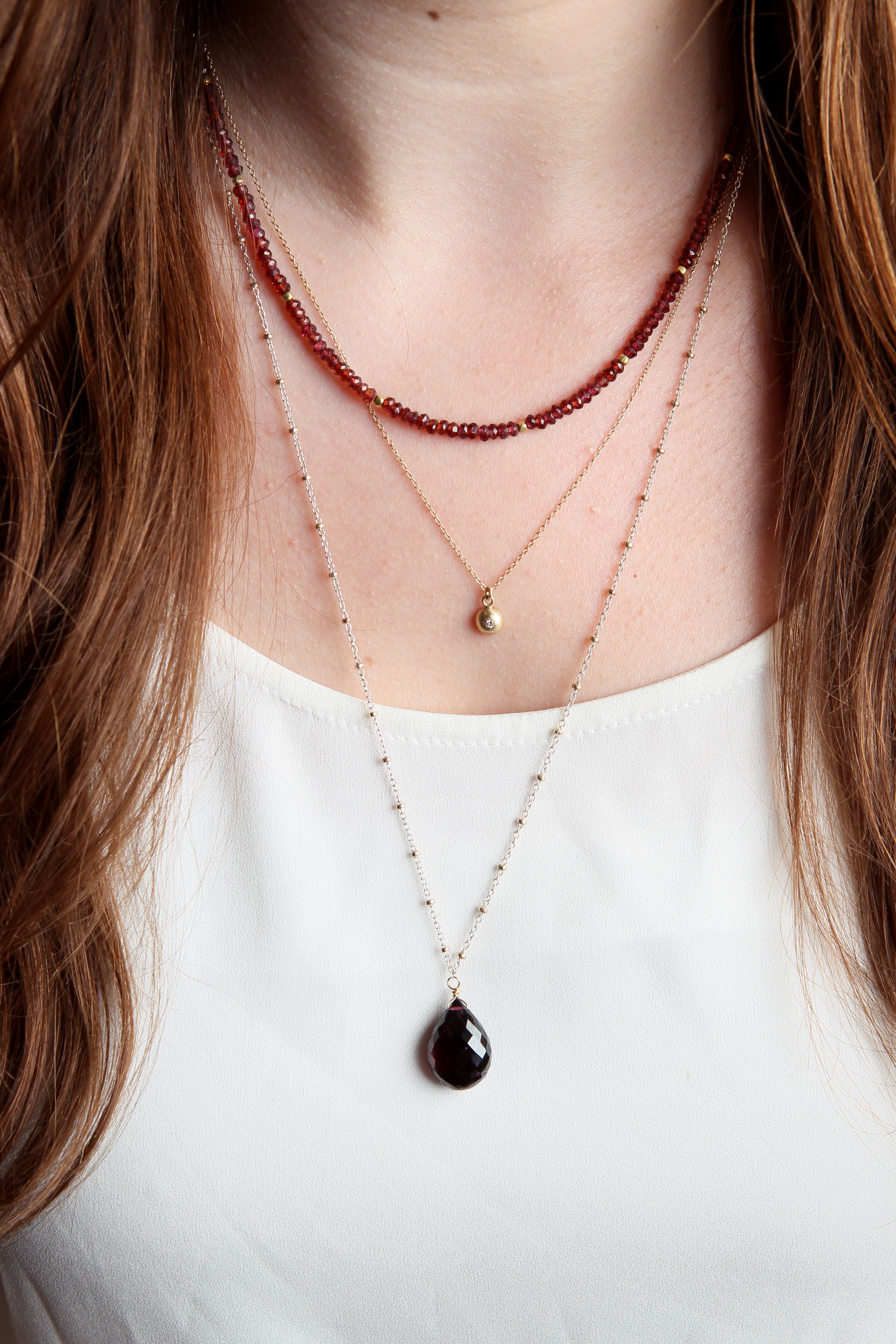 “Layering necklaces, like any other styling, comes with practice,” says jeweler Laura Preshong.