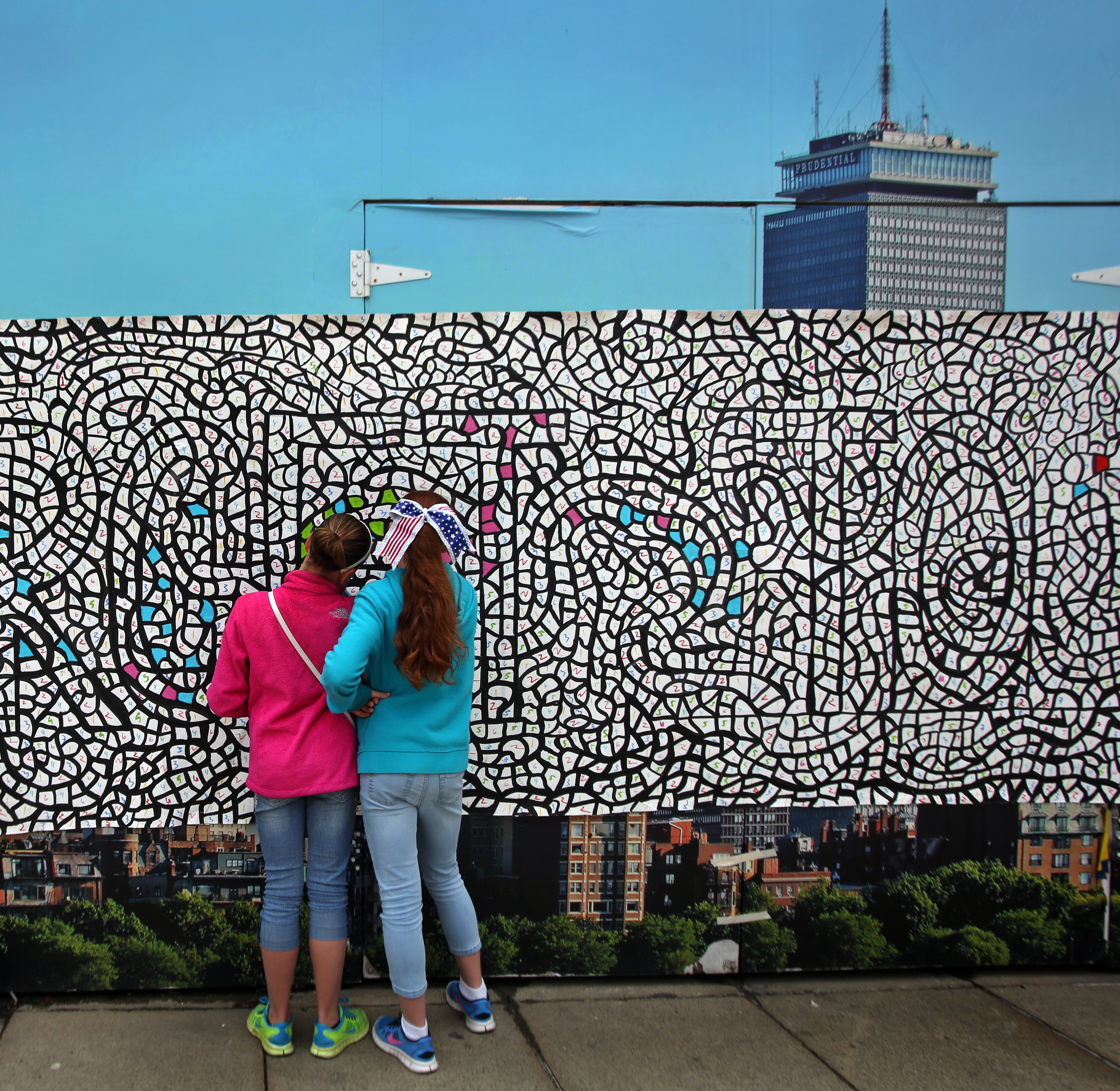 A 60-foot community mural was created outside of the Prudential Center on Memorial Day last year.