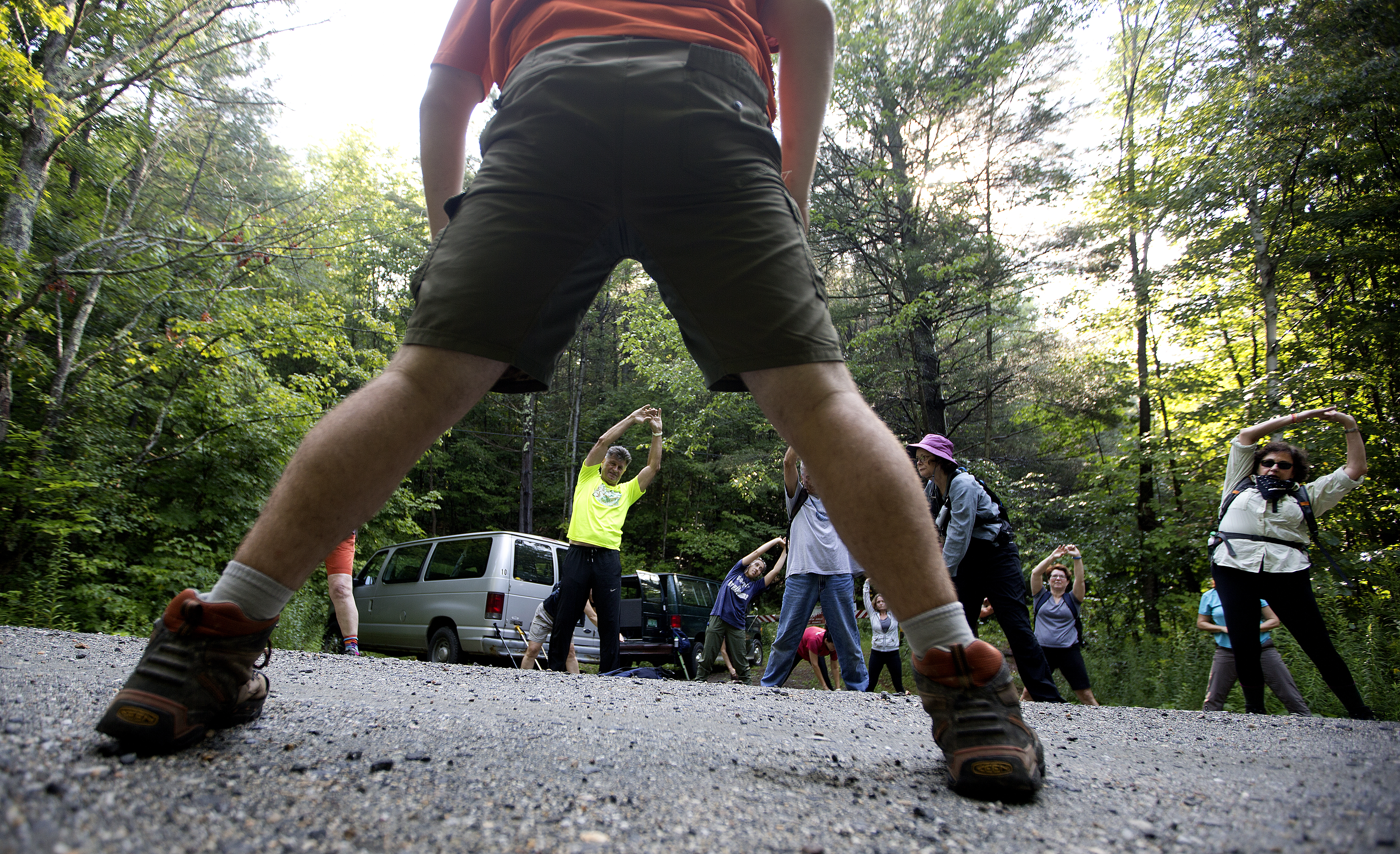 New Life Hiking Spa guests stretch before walking a trail.