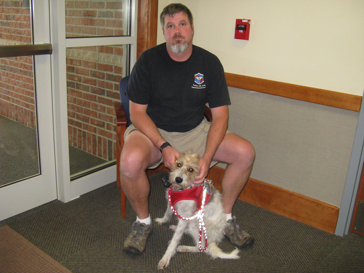 James Glaser, an Iraq war veteran, and his service dog, Jack, a Jack Russell terrier, were turned away from an Oxford diner.