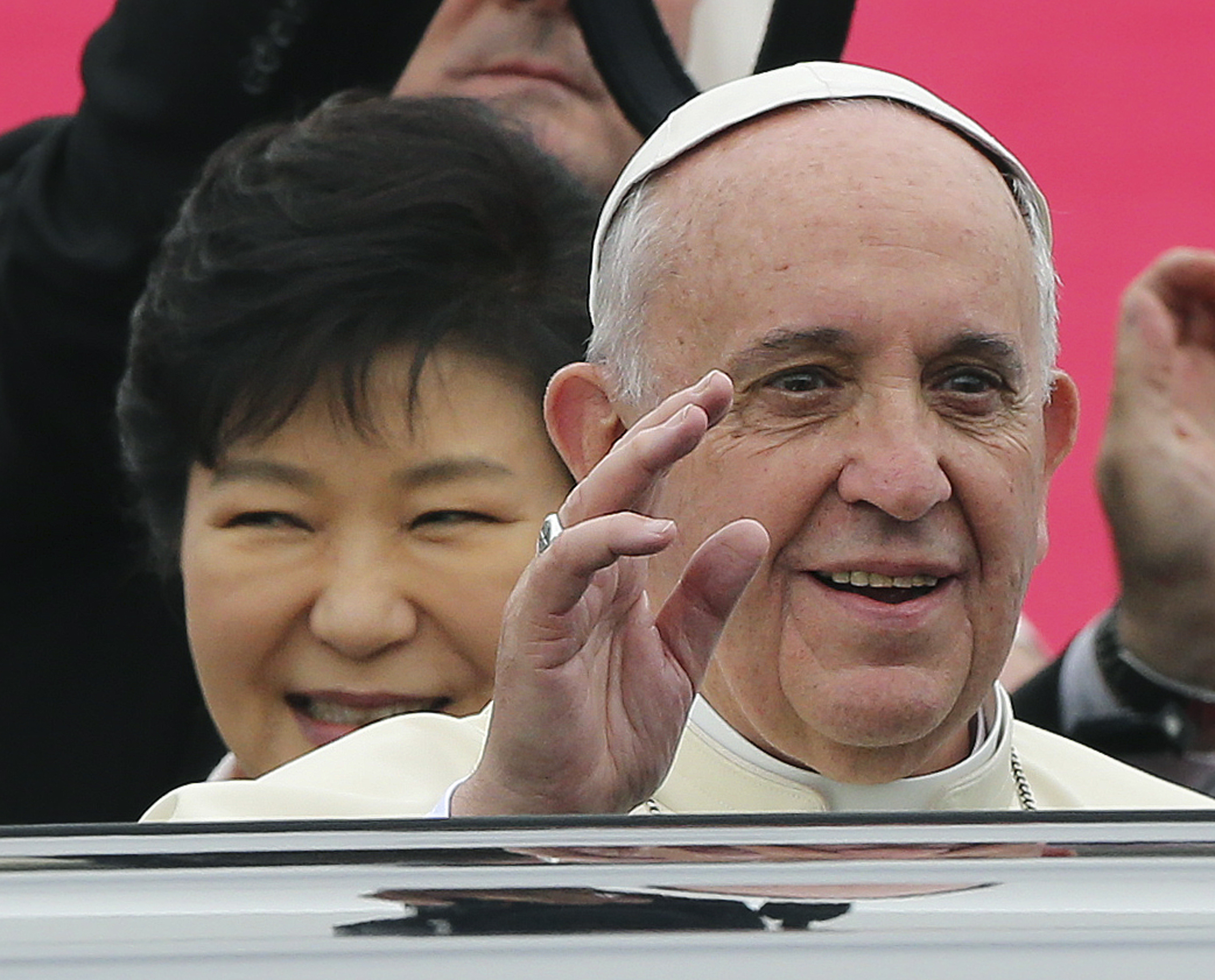 Pope Francis waved Thursday upon his arrival at Seoul Air Base in Seongnam, South Korea.