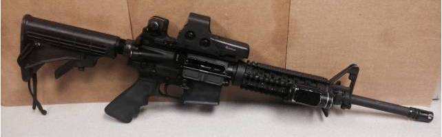 The stolen Colt M16-A1 (above) and HS Precision Pro-Series 2000 Sniper rifles were left in an FBI SWAT vehicle.