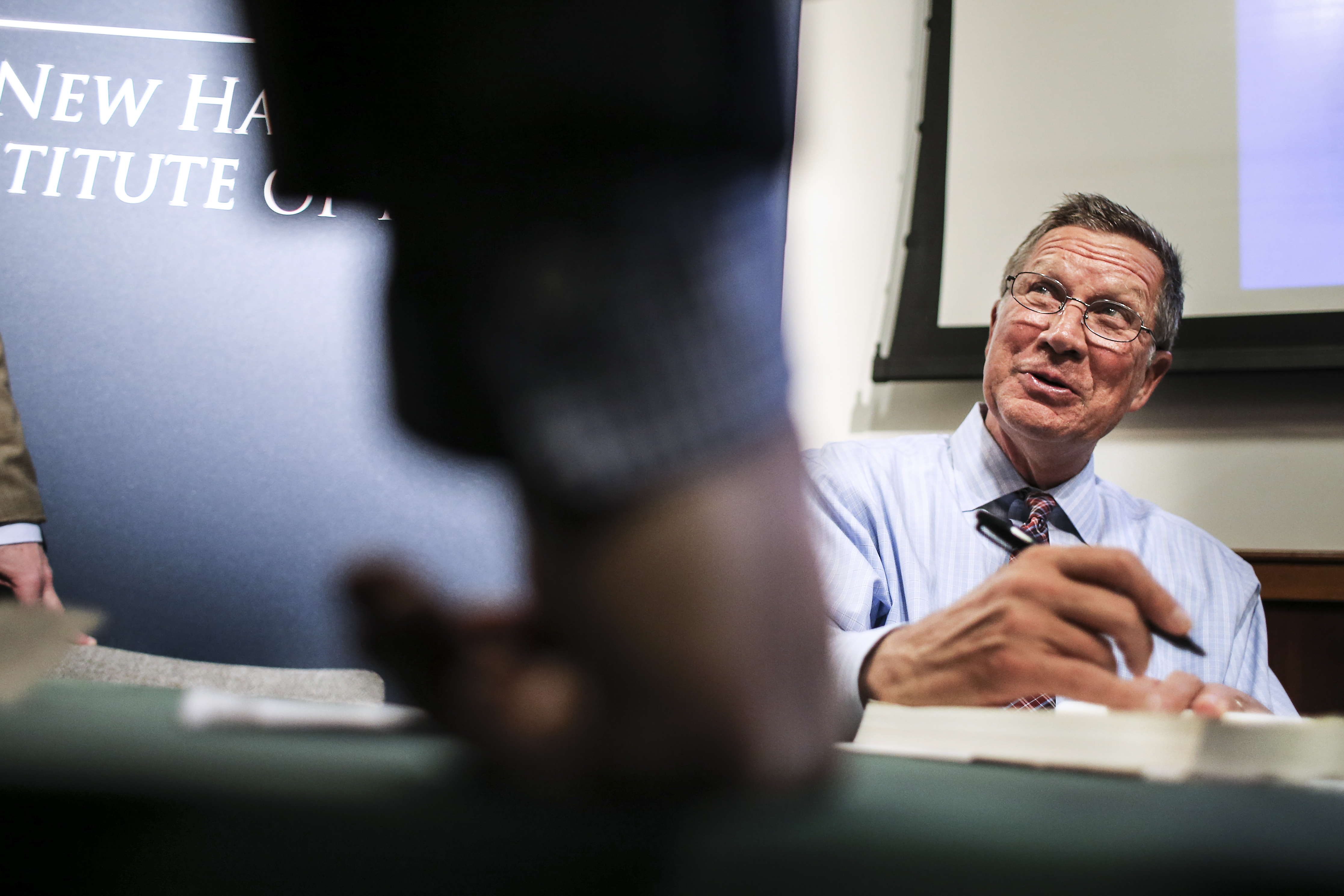 Ohio Governor John Kasich held a book signing after discussing his new book "Two Paths: America Divided or United" at The New Hampshire Institute of Politics at Saint Anselm College in Goffstown, N.H. last April.