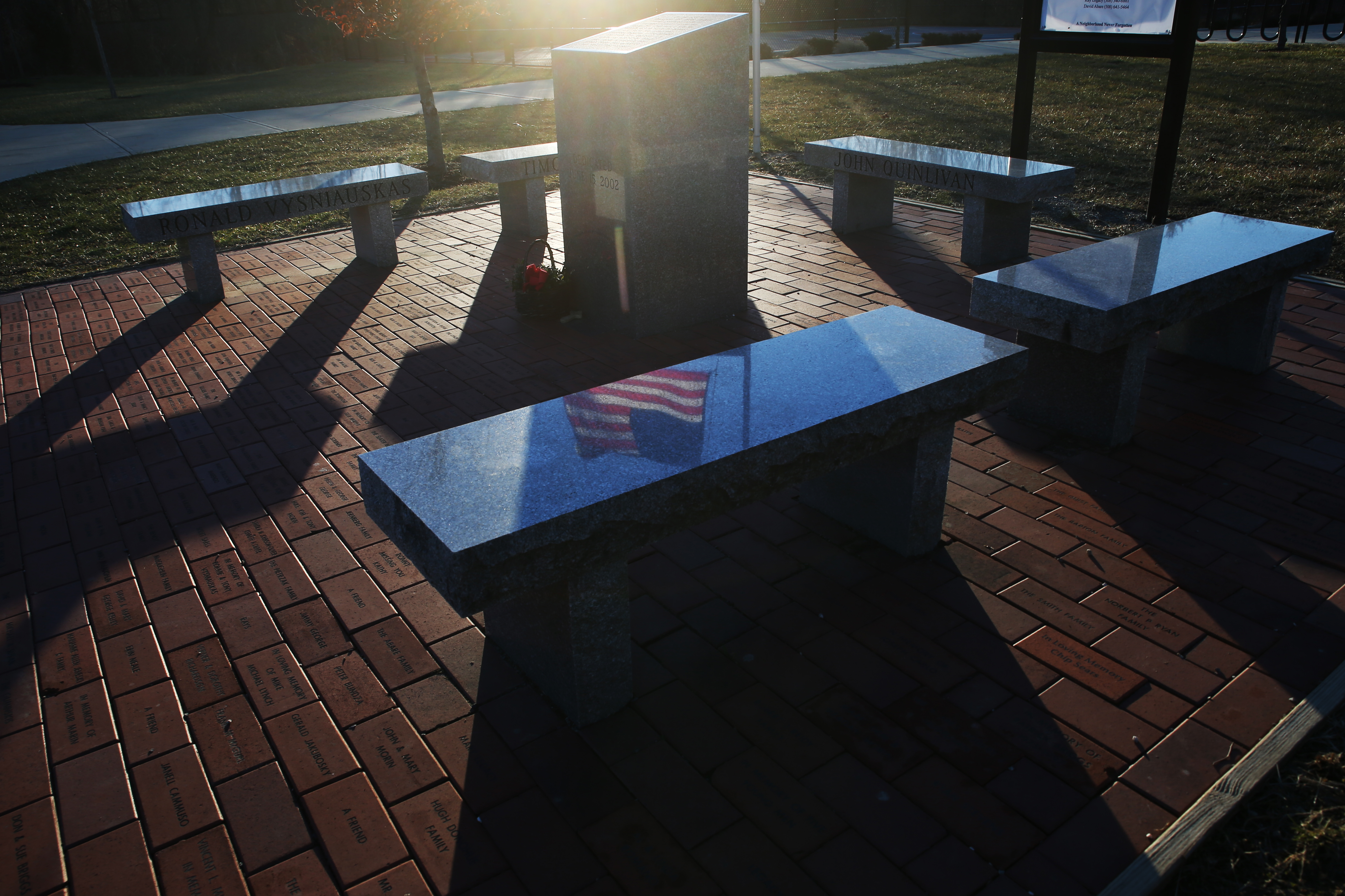 A memorial honors the five boys who died in the fire.