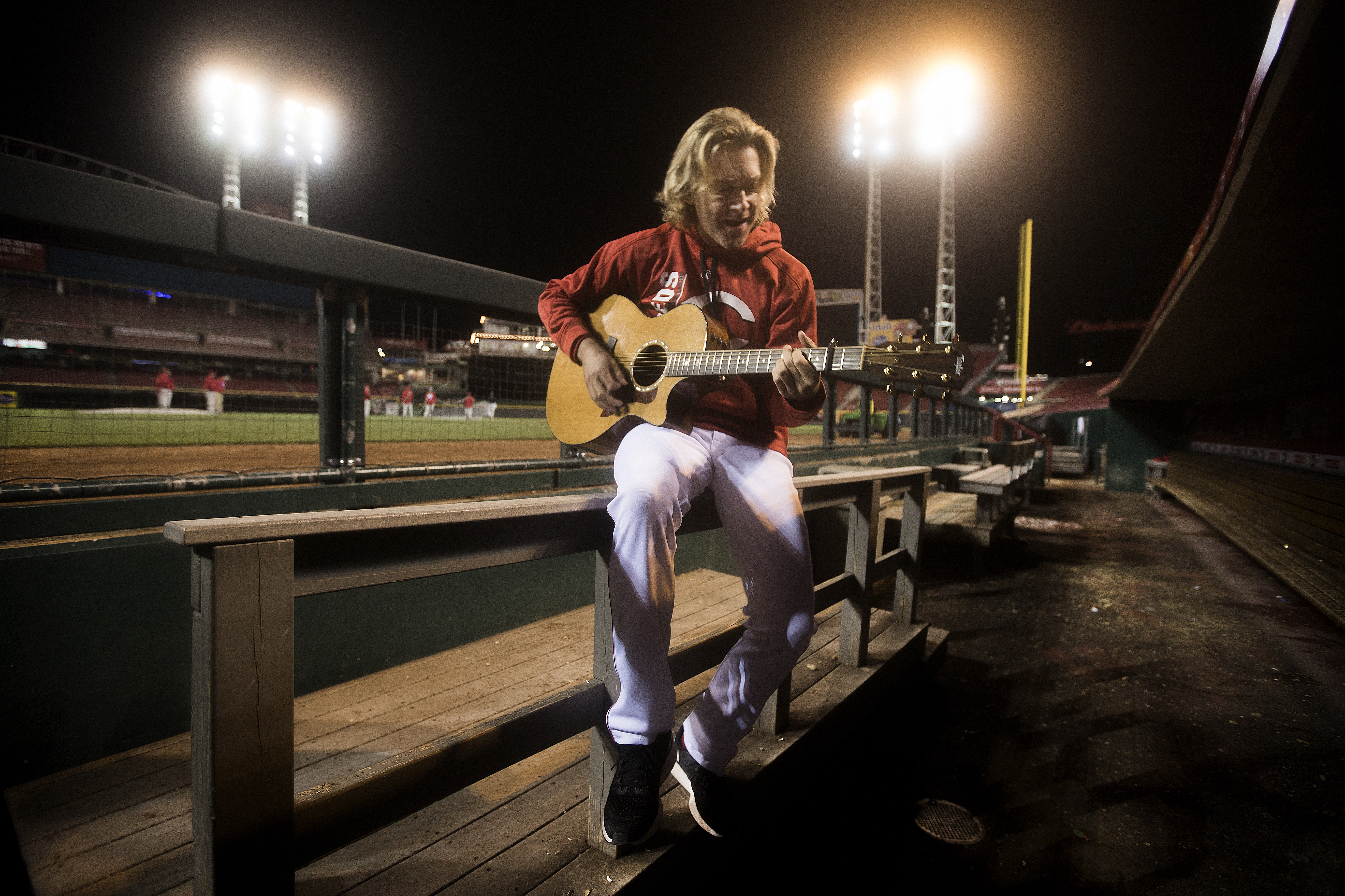 Arroyo still strums the guitar.