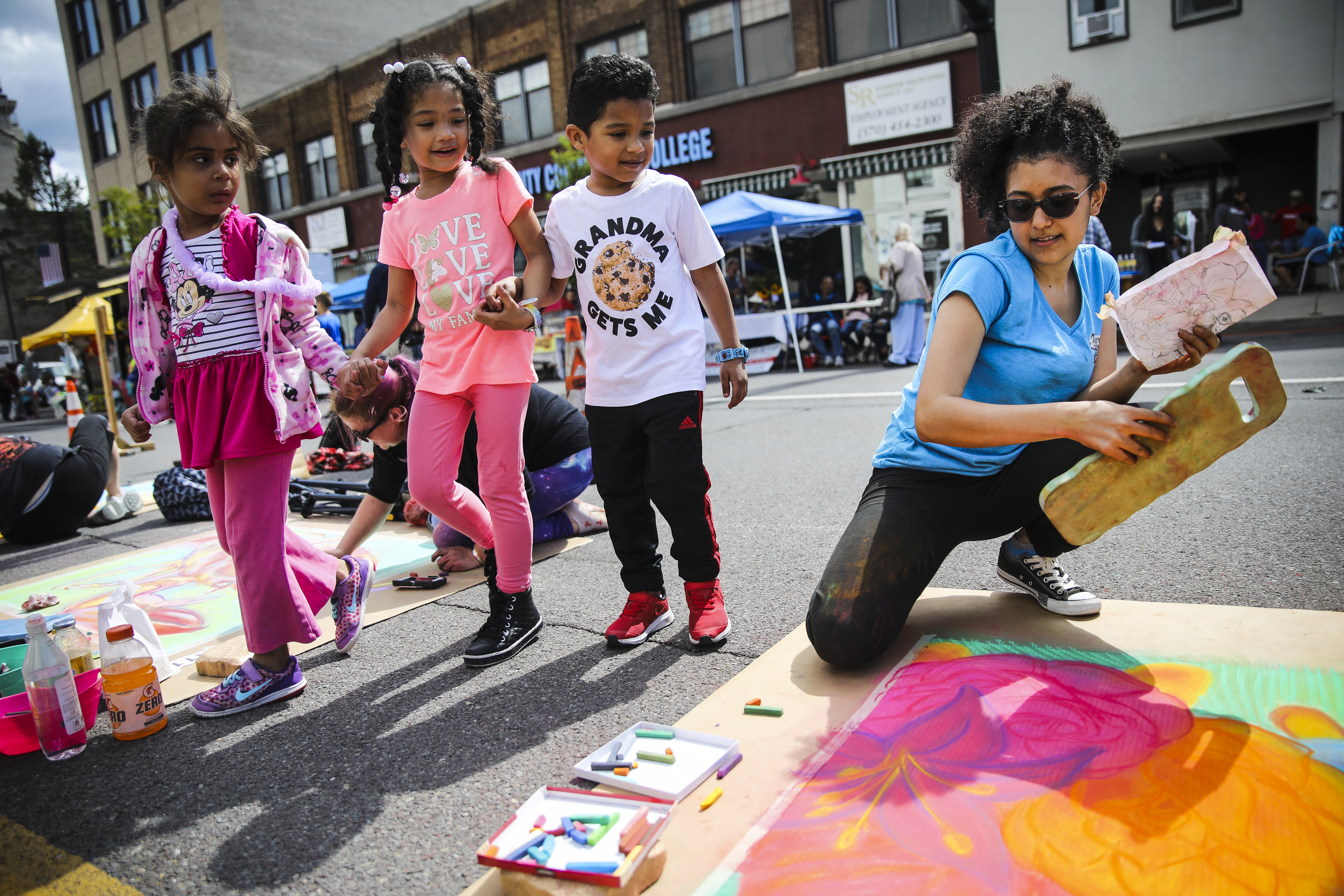 Mariluz Rodriguez finished her chalk drawing as she competed in "Peace, Love, Chalk," a four-hour competition that took place in the middle of Broad Street in Hazleton.