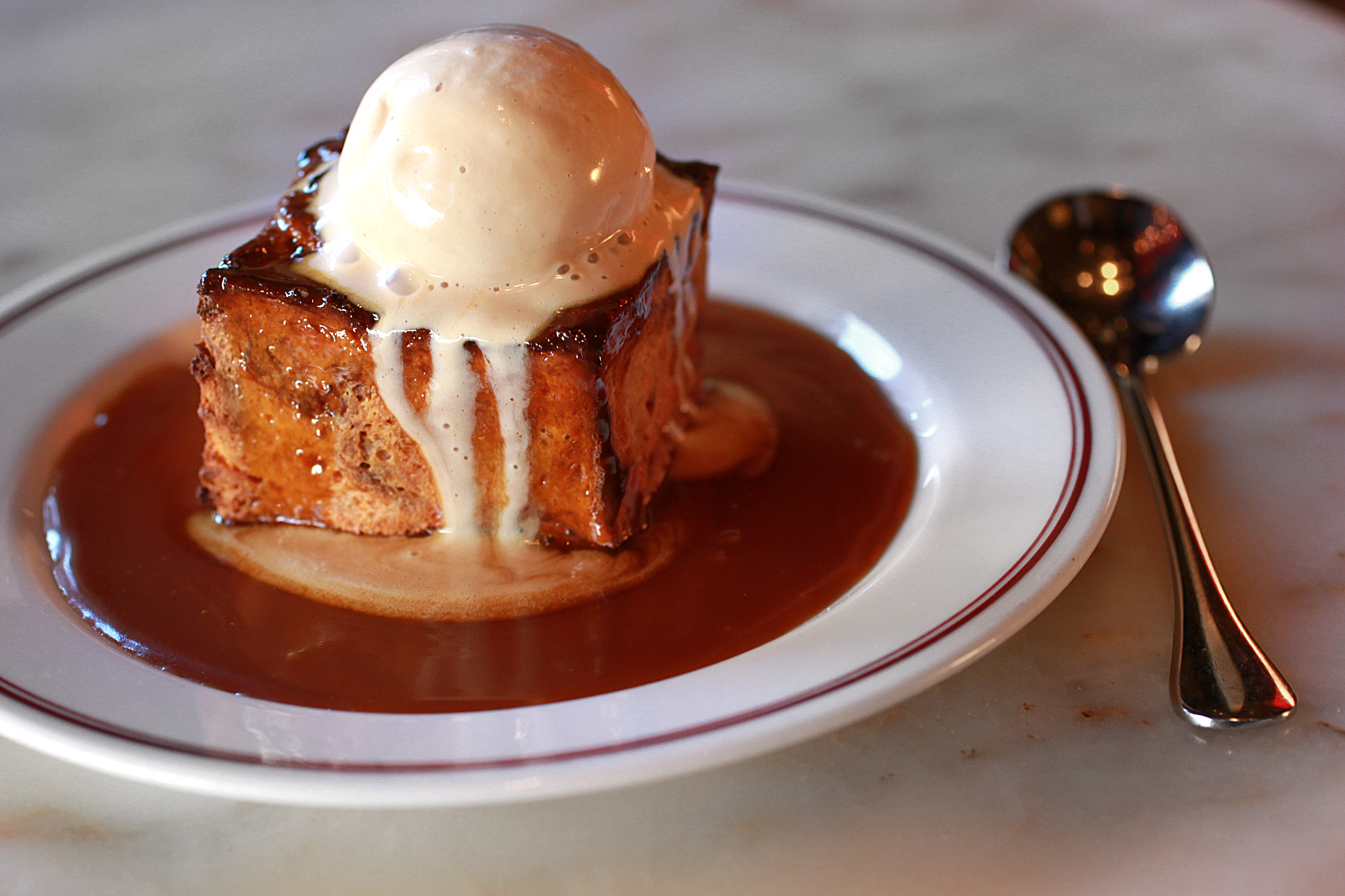 Butterscotch bread pudding with praline ice cream and salted caramel.