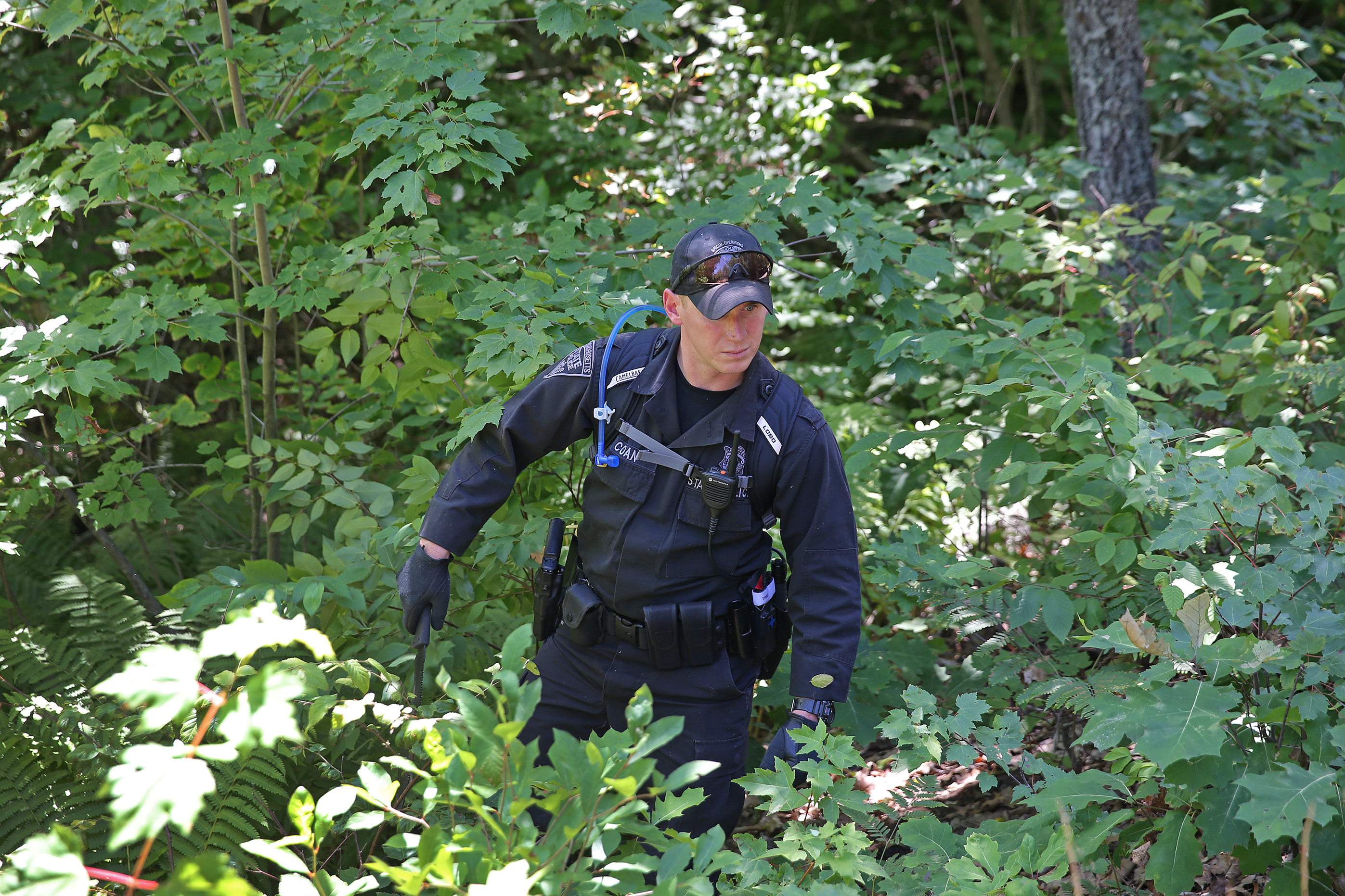 State Police searched woodlands in Princeton near where the victim’s body was discovered.