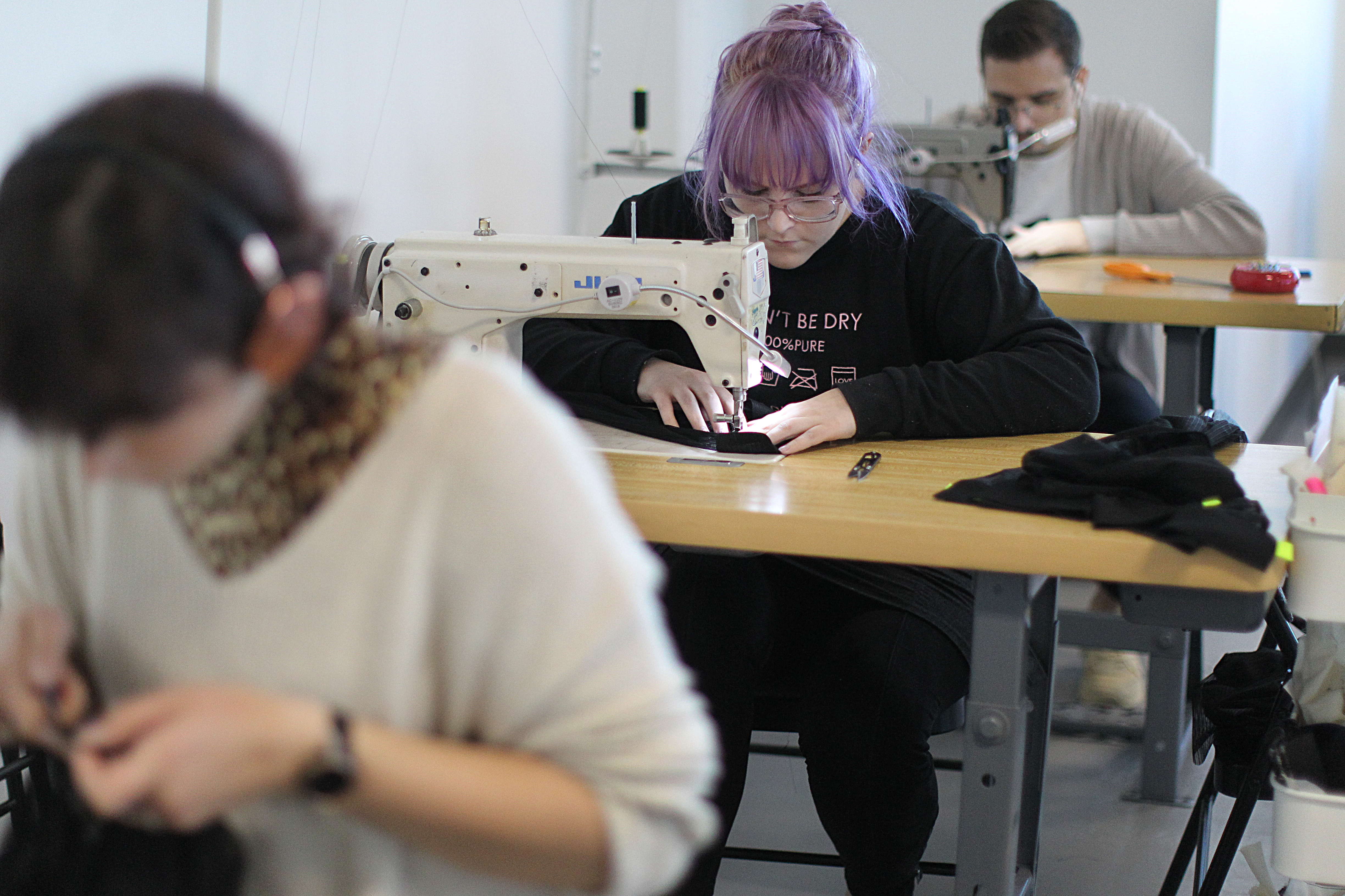 Workers at ThreadTech.