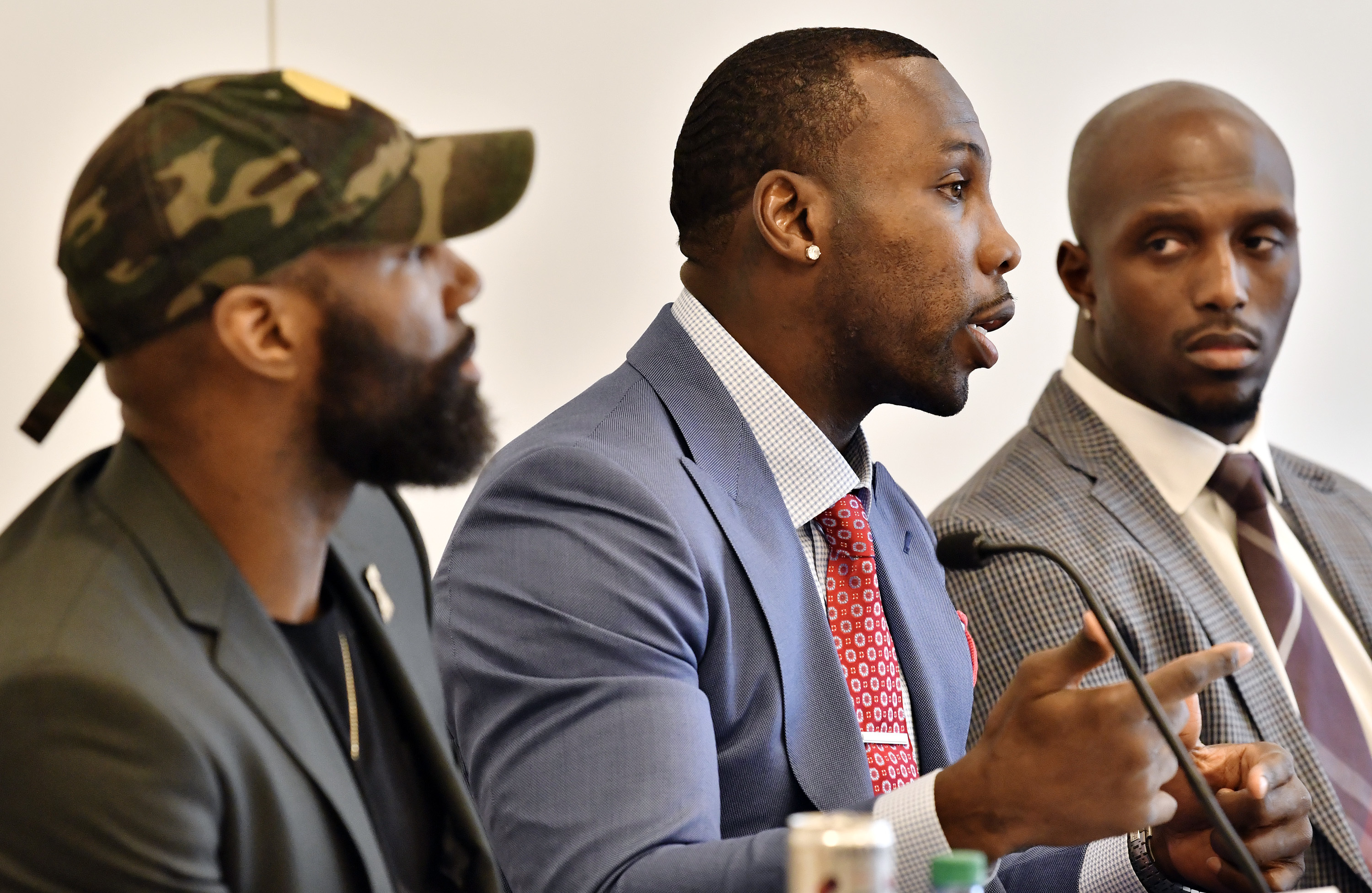 From left, Malcolm Jenkins, Anquan Boldin, and Devin McCourty took part in a discussion of criminal justice issues with other current and former NFL football players at Harvard Law School last week.