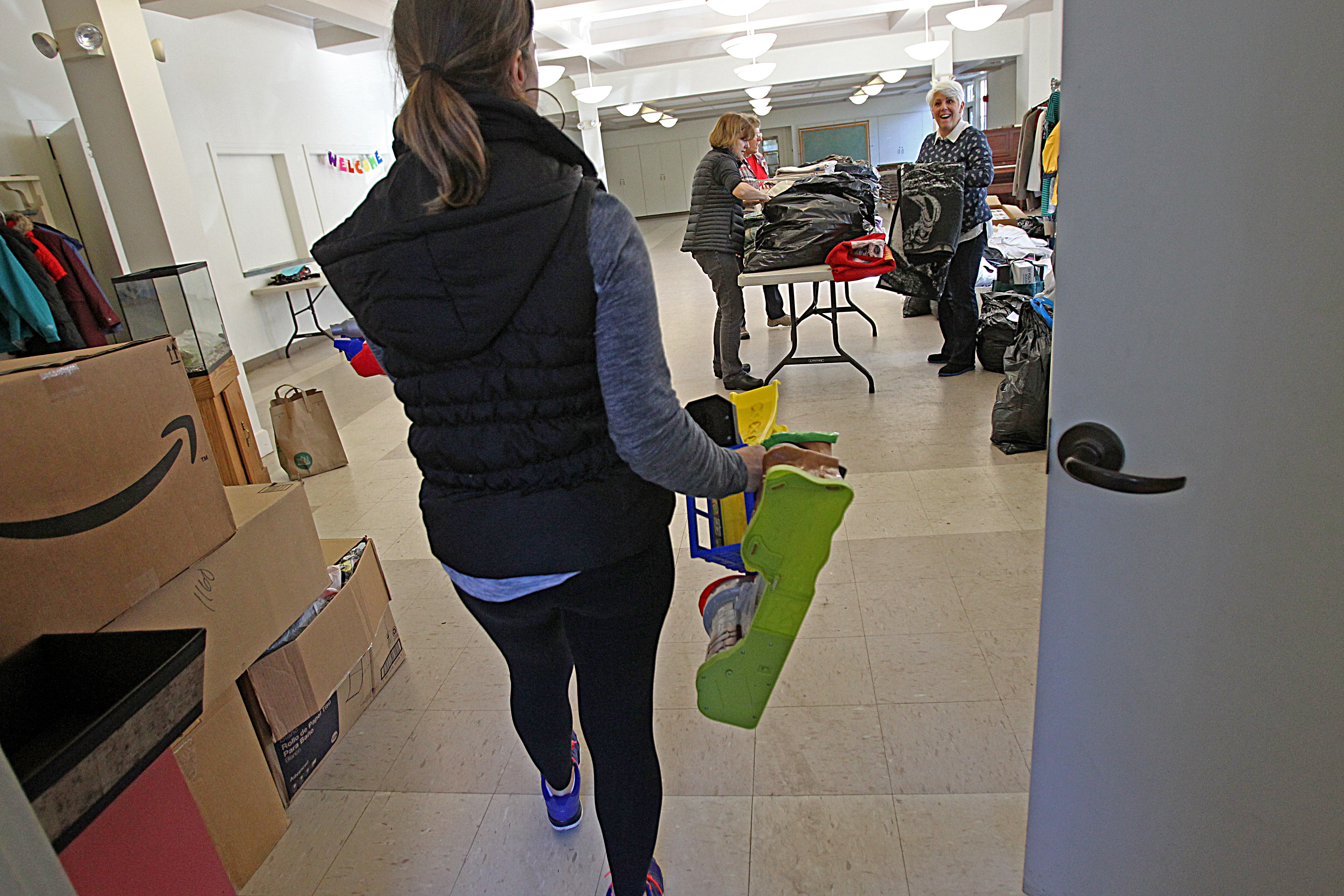 Jennifer Sacca Courtney donated children’s toys at the Plymouth Congregational Church.