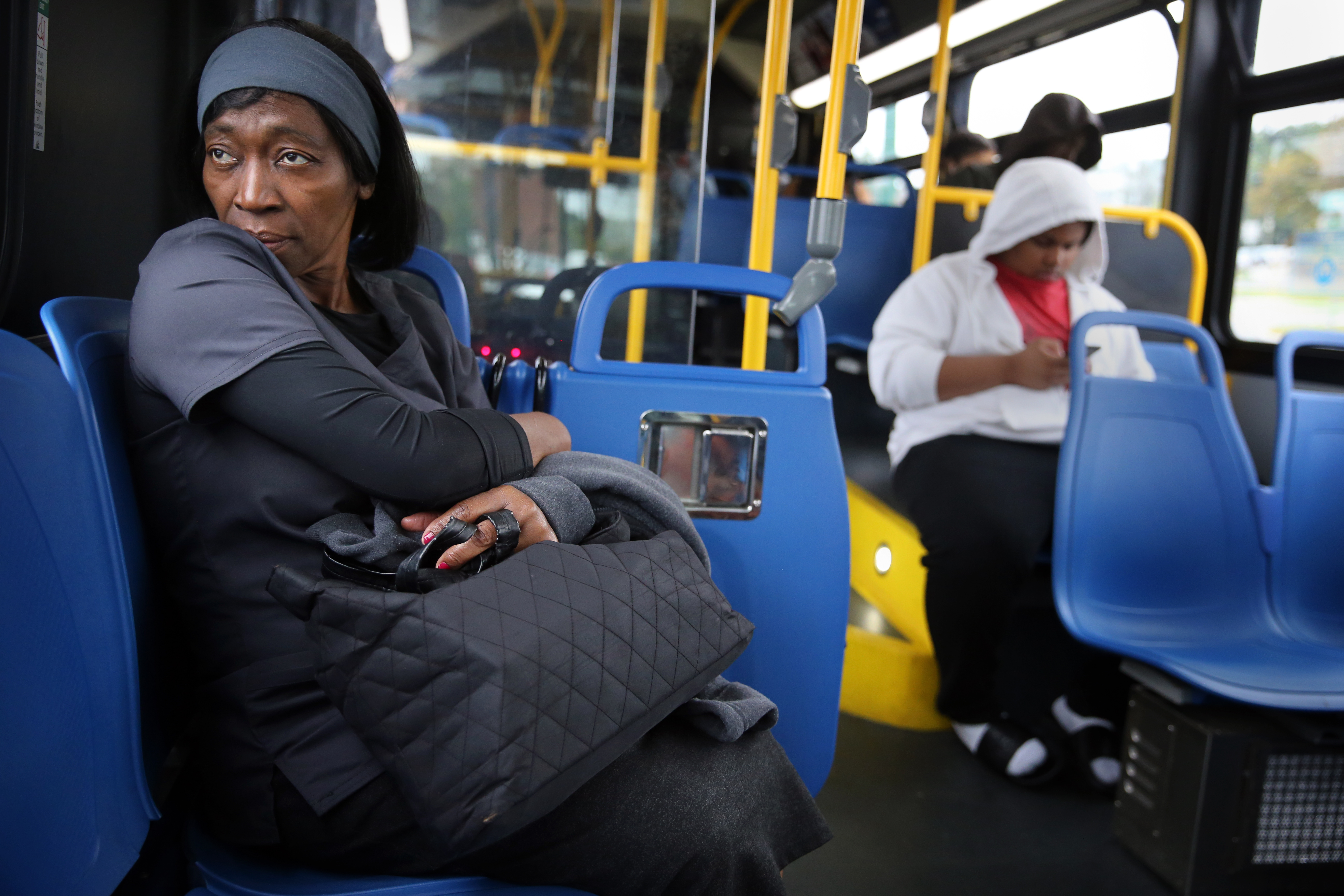 Marie Cajuste rode a city bus from her boarding house in Dorchester to her job in West Roxbury. She moved to the boarding house after losing her apartment because she was unable to pay the rent while being treated for cancer.