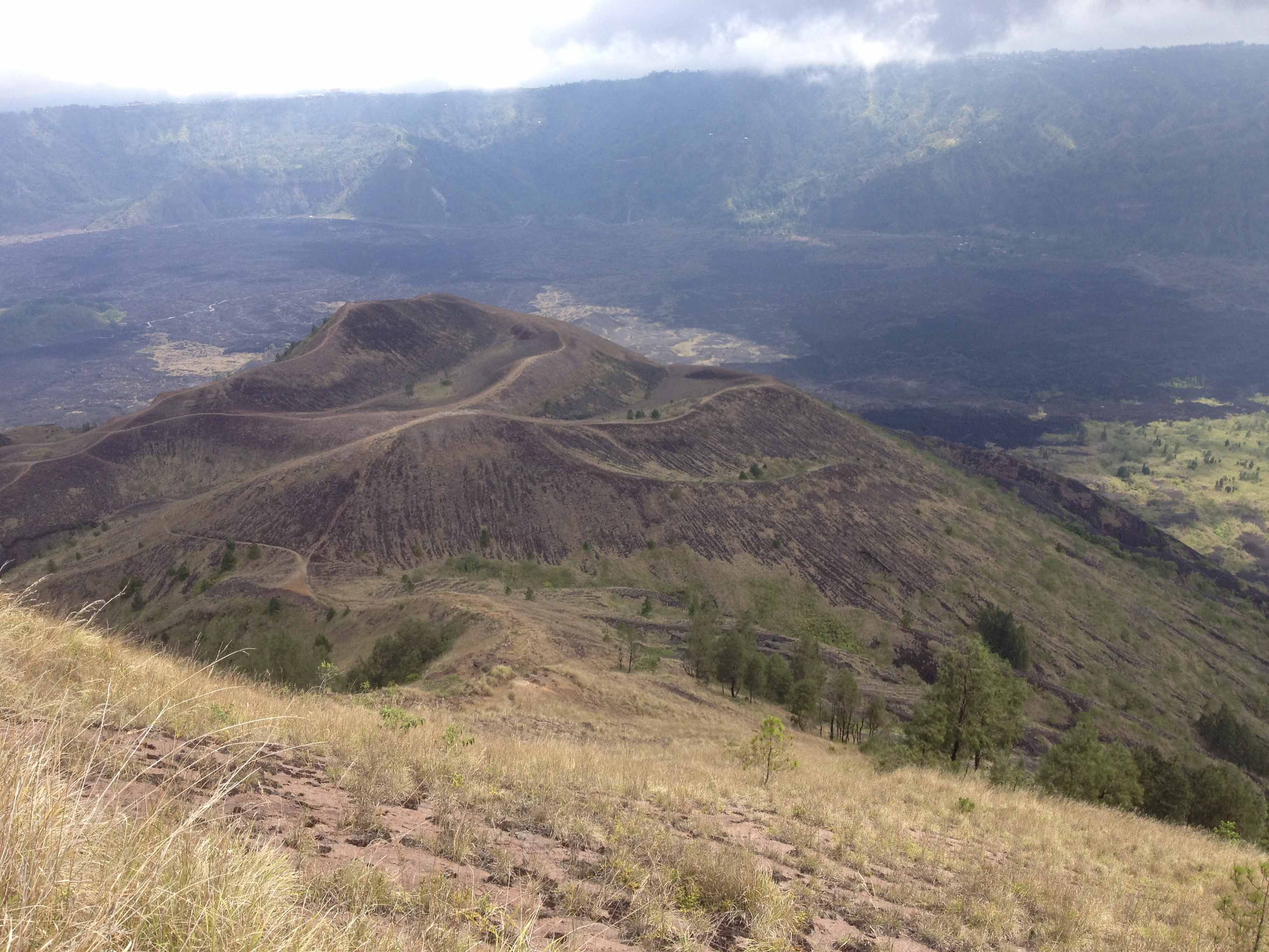 A view from Mount Batur’s top, looking toward the new craters and the charred land.