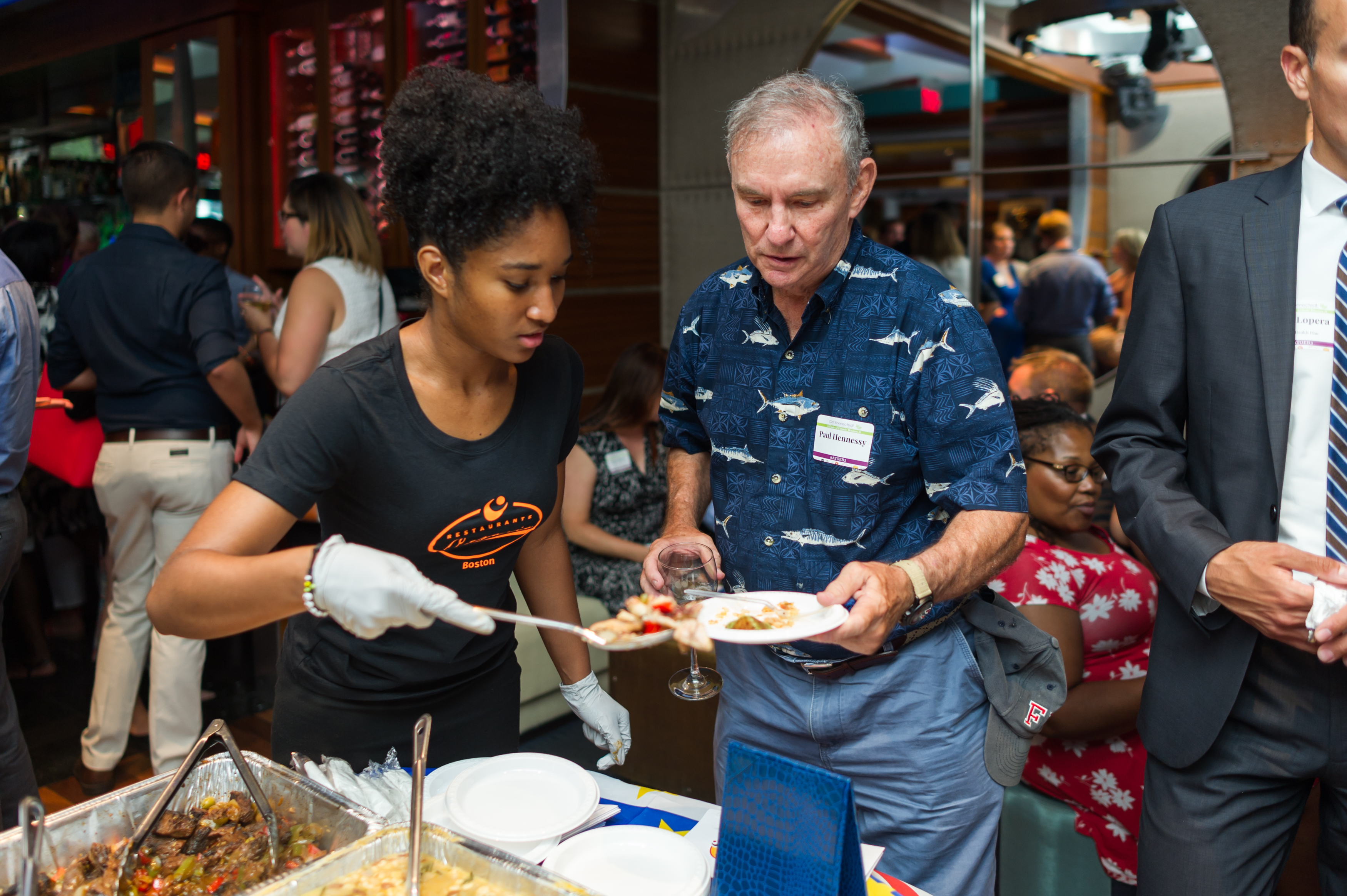 A guest is served at last year’s Taste of Ethnic Boston.