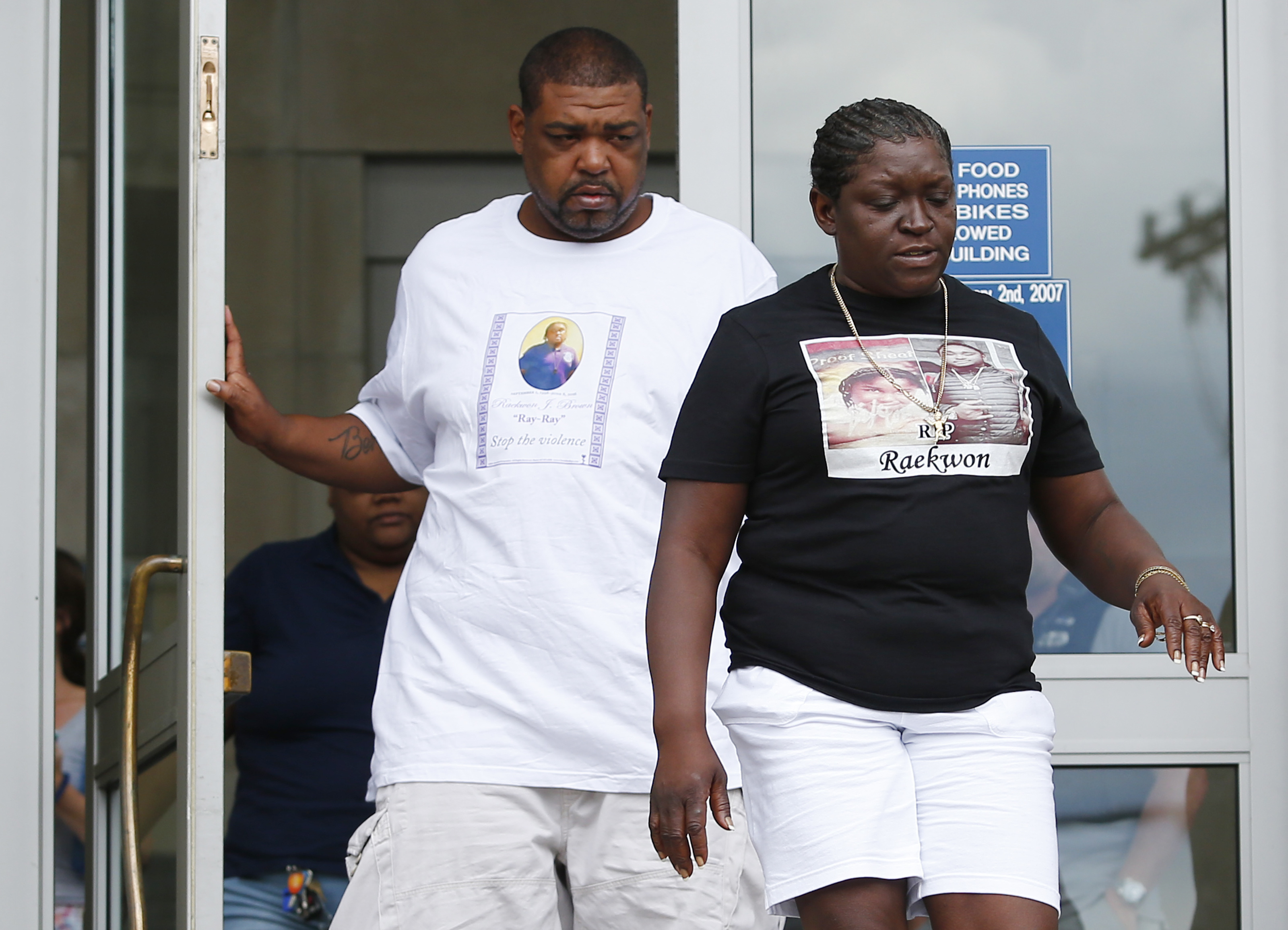 Raekwon Brown's parents left Dorchester District Court following the arraignment of suspects in their son’s murder.