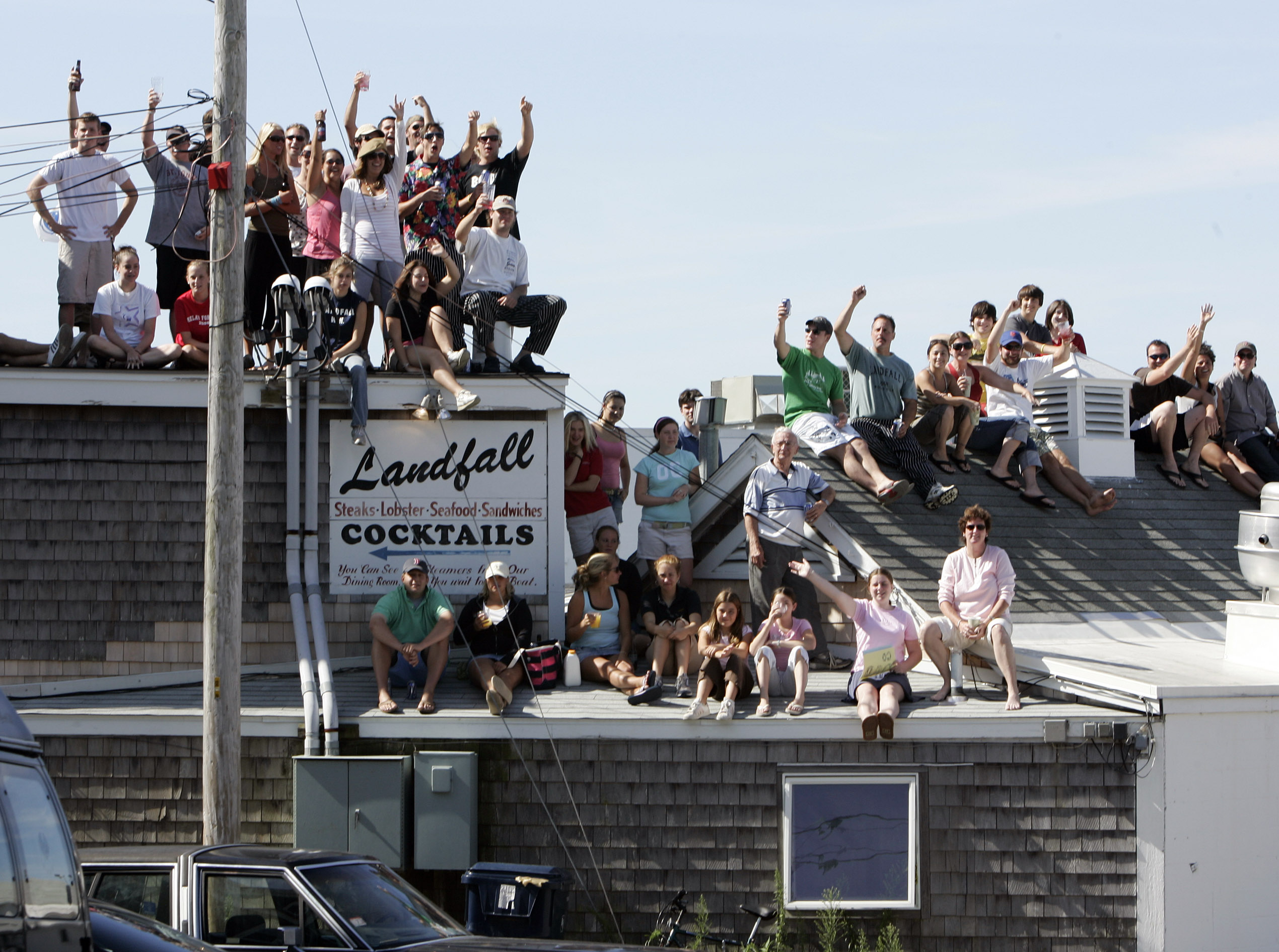 Some spectators, like these shown in 2006, even watch from rooftops.