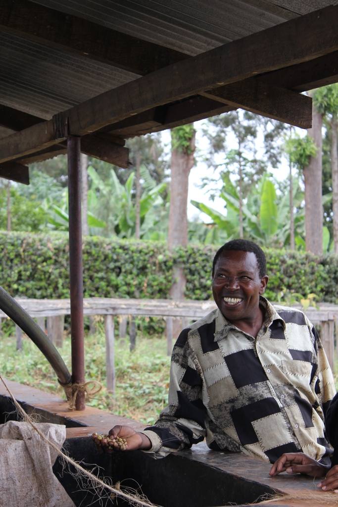 Kenyan coffee farmer Symon’s loans facilitated coffee investments that turned profitable in the first year.