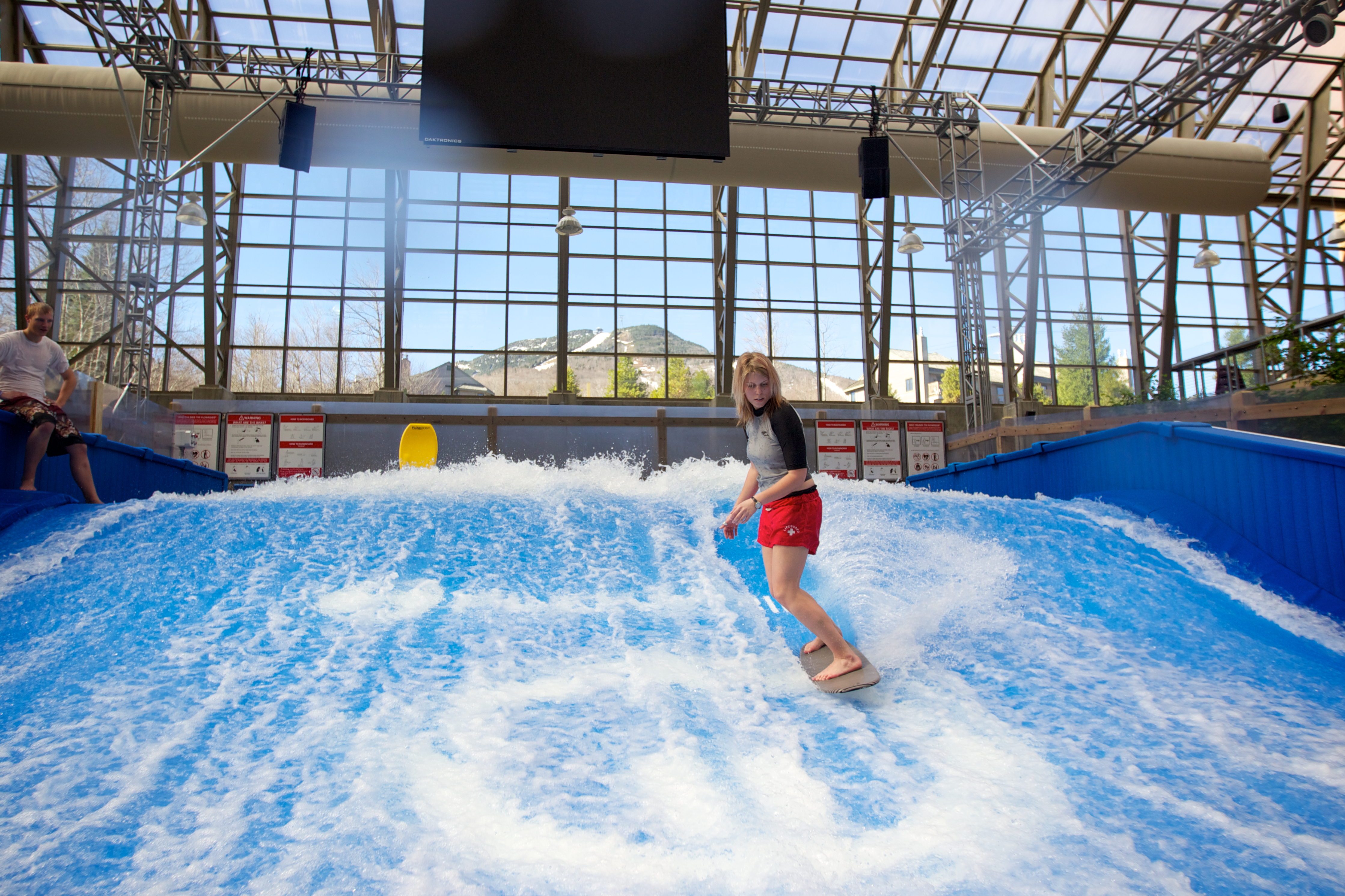 A surfer takes advantage of perfect waves at Jay Peak’s Pump House.