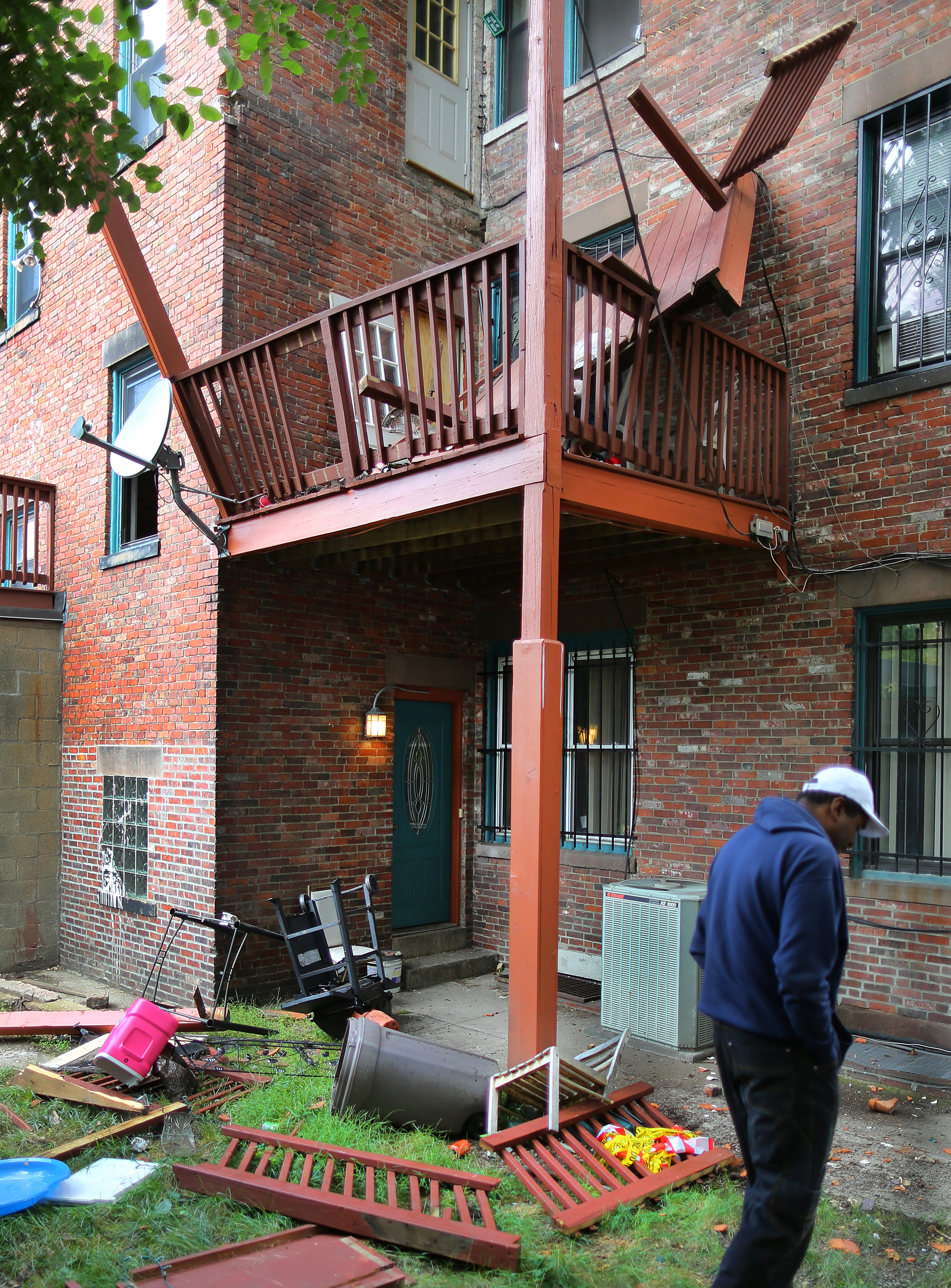 A Museum of Fine Arts student and 11 others were injured after this illegal third floor deck in Mission Hill collapsed. The city later cited the property owner.