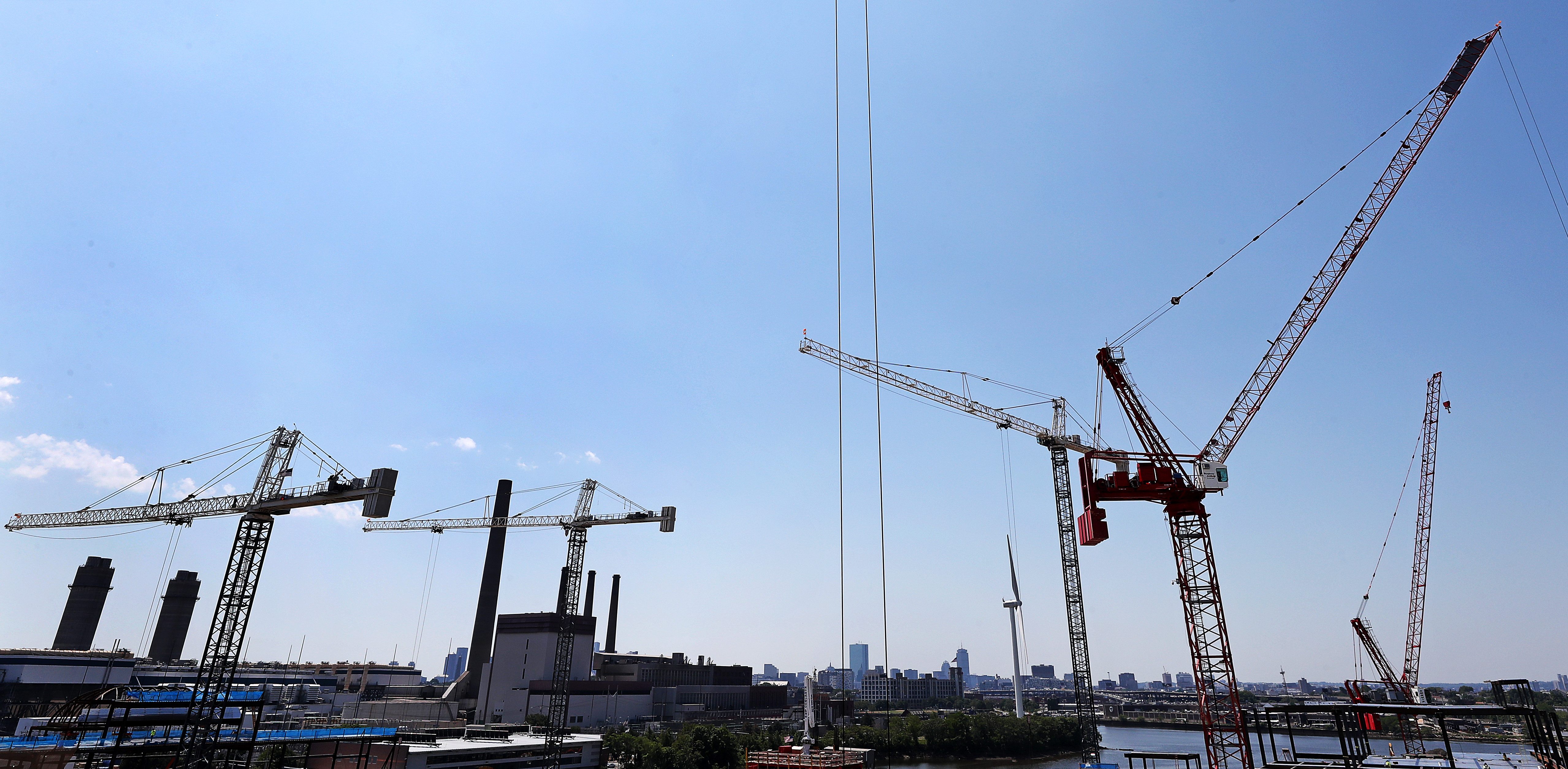 Cranes rose from the construction site.