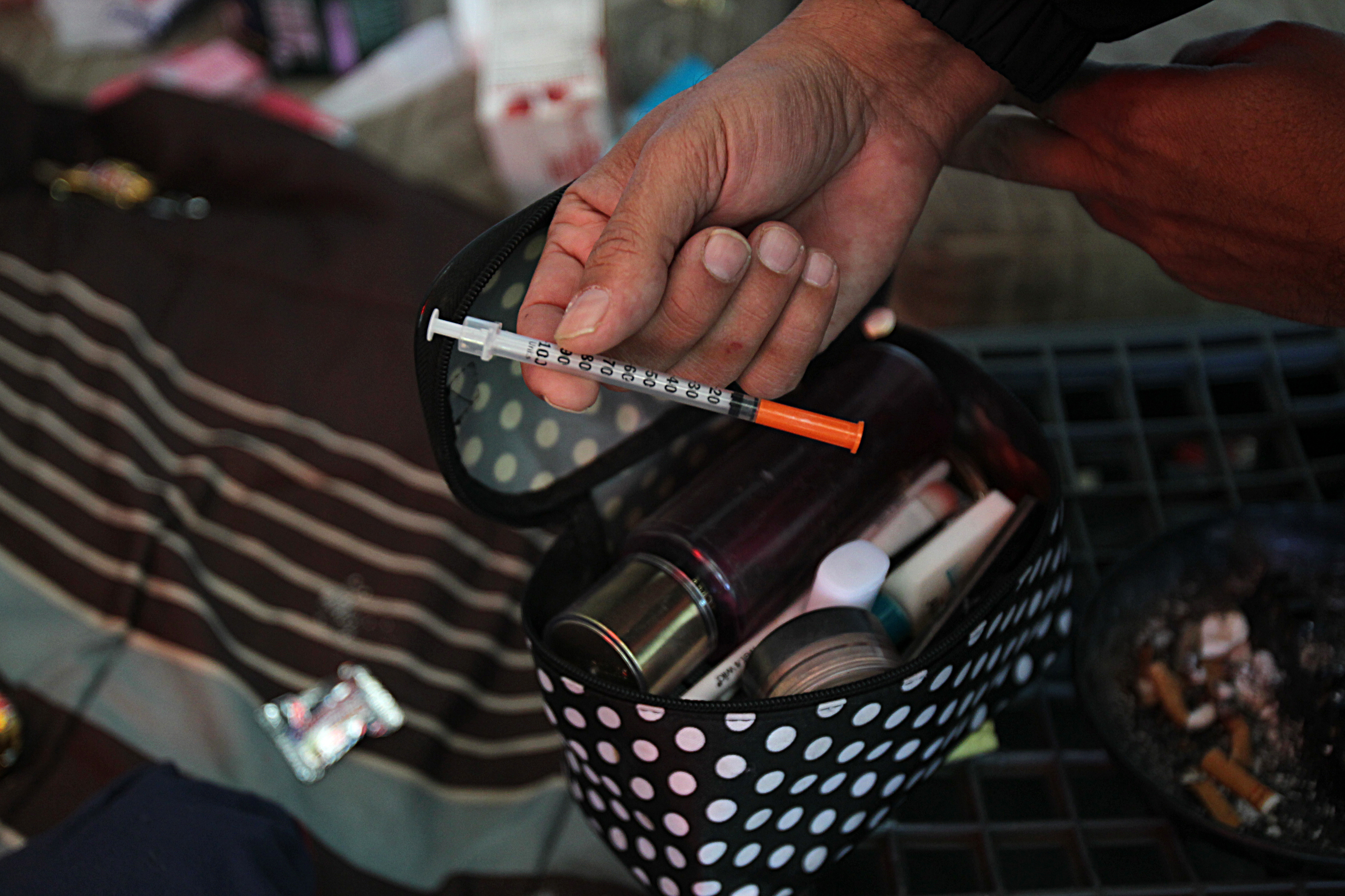 An outreach worker found a needle while searching a tent at the camp.