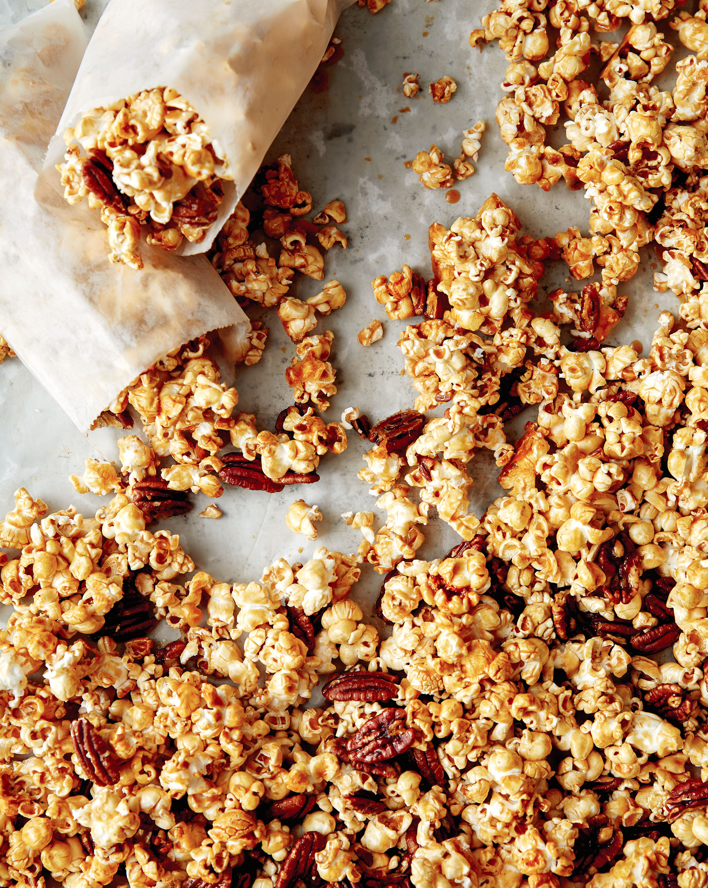 Sticky bun popcorn can be stored for a week in an airtight container.